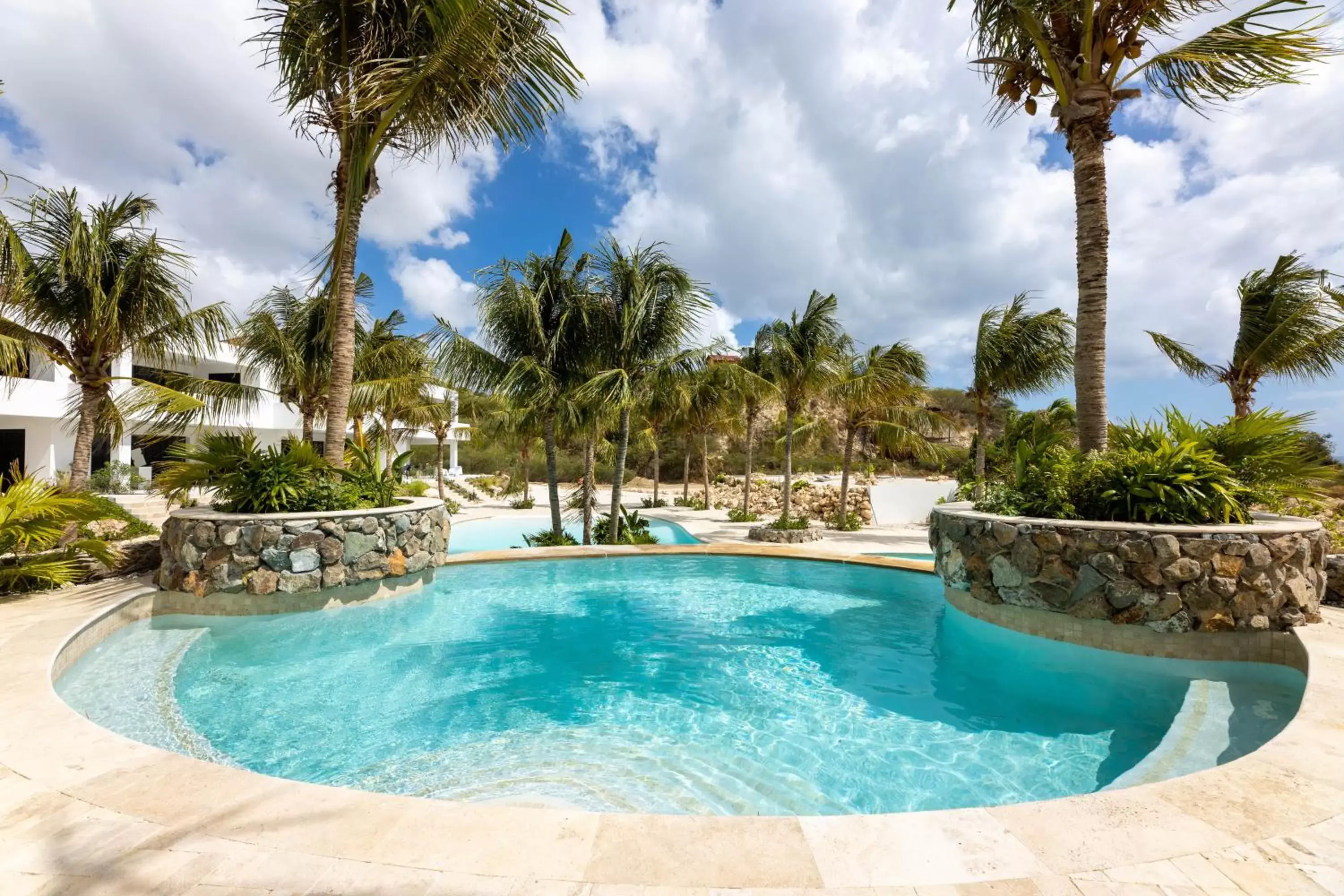 Pool view in The Reef - Blue Bay Golf & Beach Resort Pool view in The Reef - Blue Bay Golf & Beach Resort