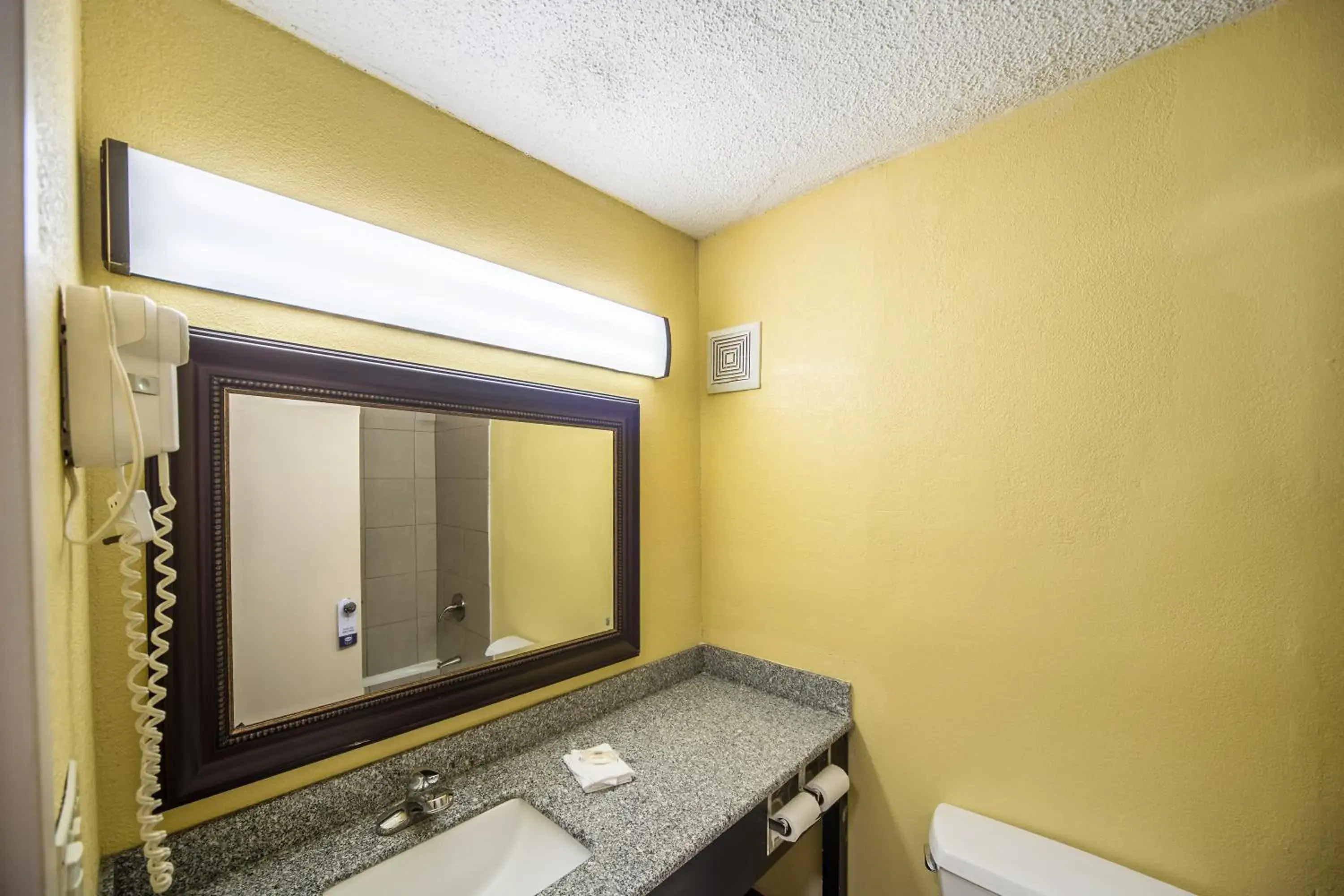 Bathroom in Suburban Studios Fort Wayne