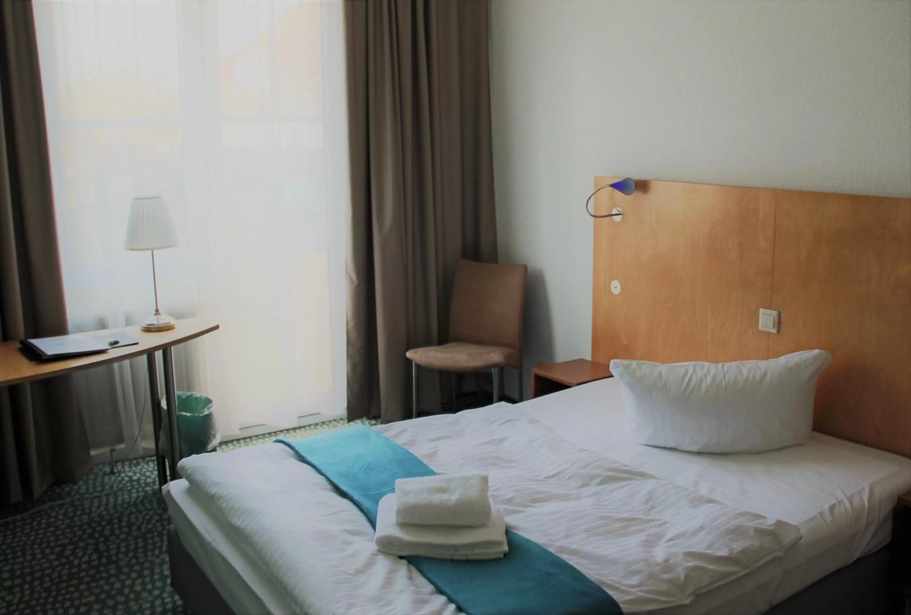 Bed in Check Inn Hotel Merseburg