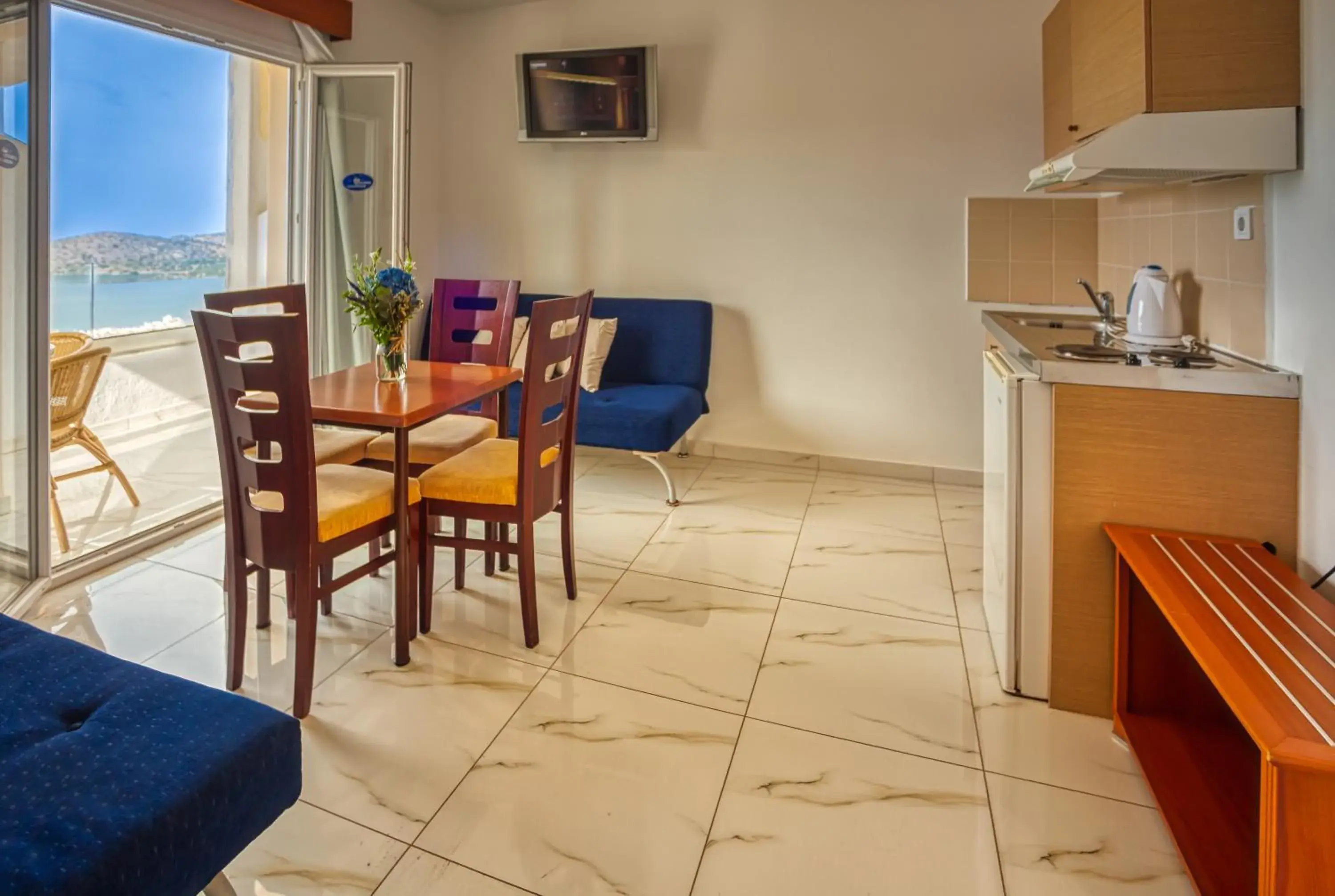 TV and multimedia, Kitchen/Kitchenette in Elounda Water Park Residence Hotel