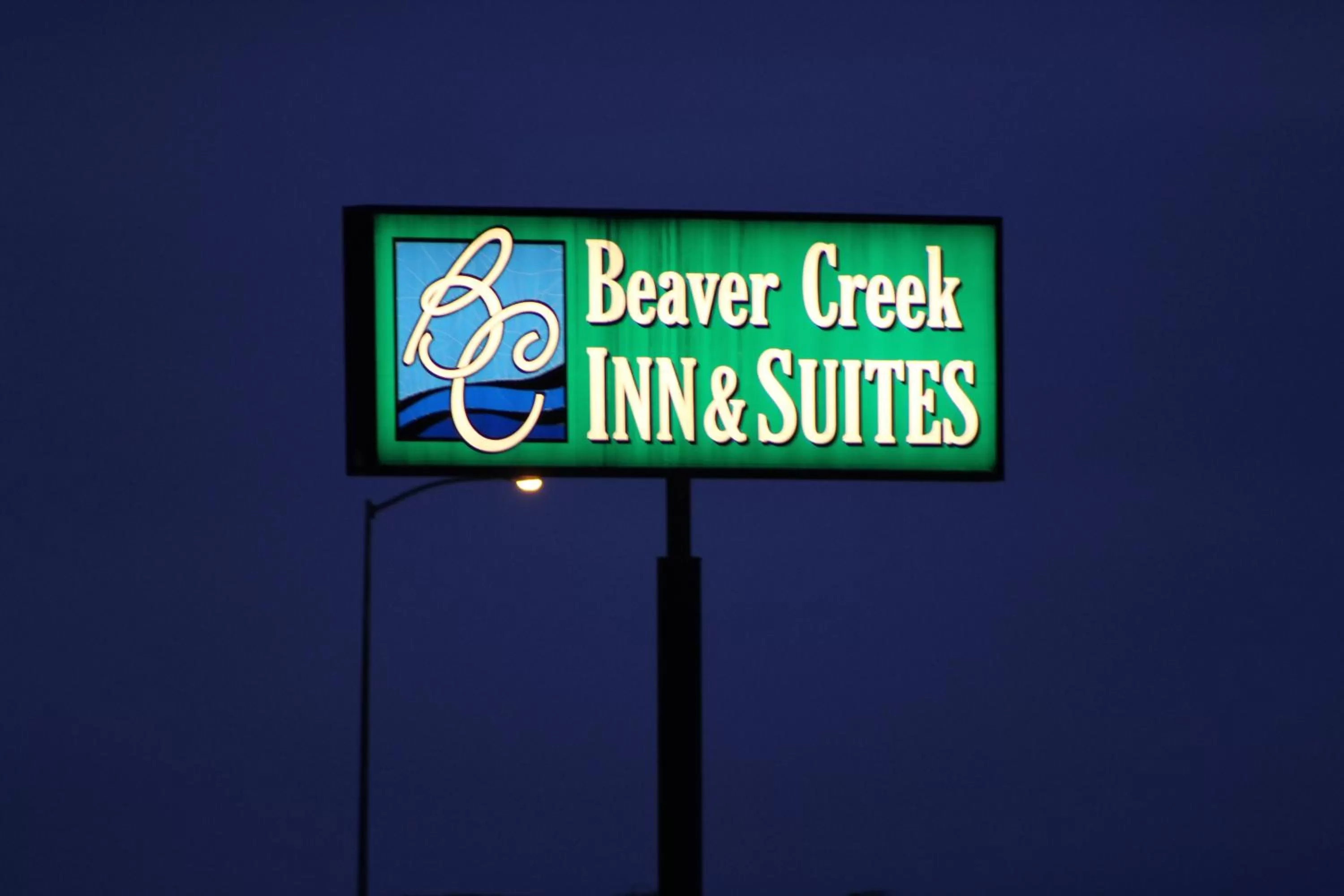 Property logo or sign in Rodeway Inn Gateway to Medora T-Roosevelt & Makoshika State Park