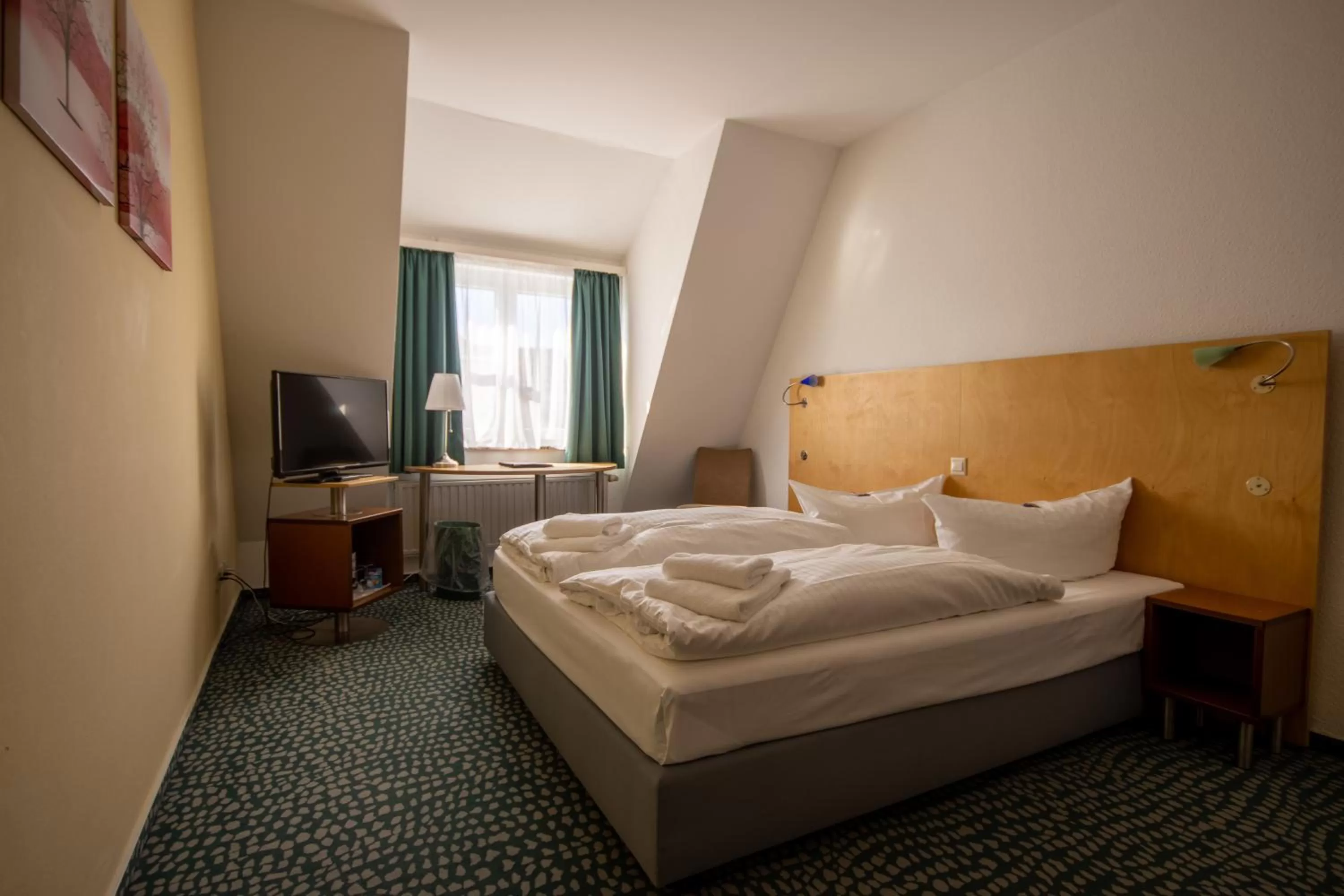Photo of the whole room, Bed in Check Inn Hotel Merseburg