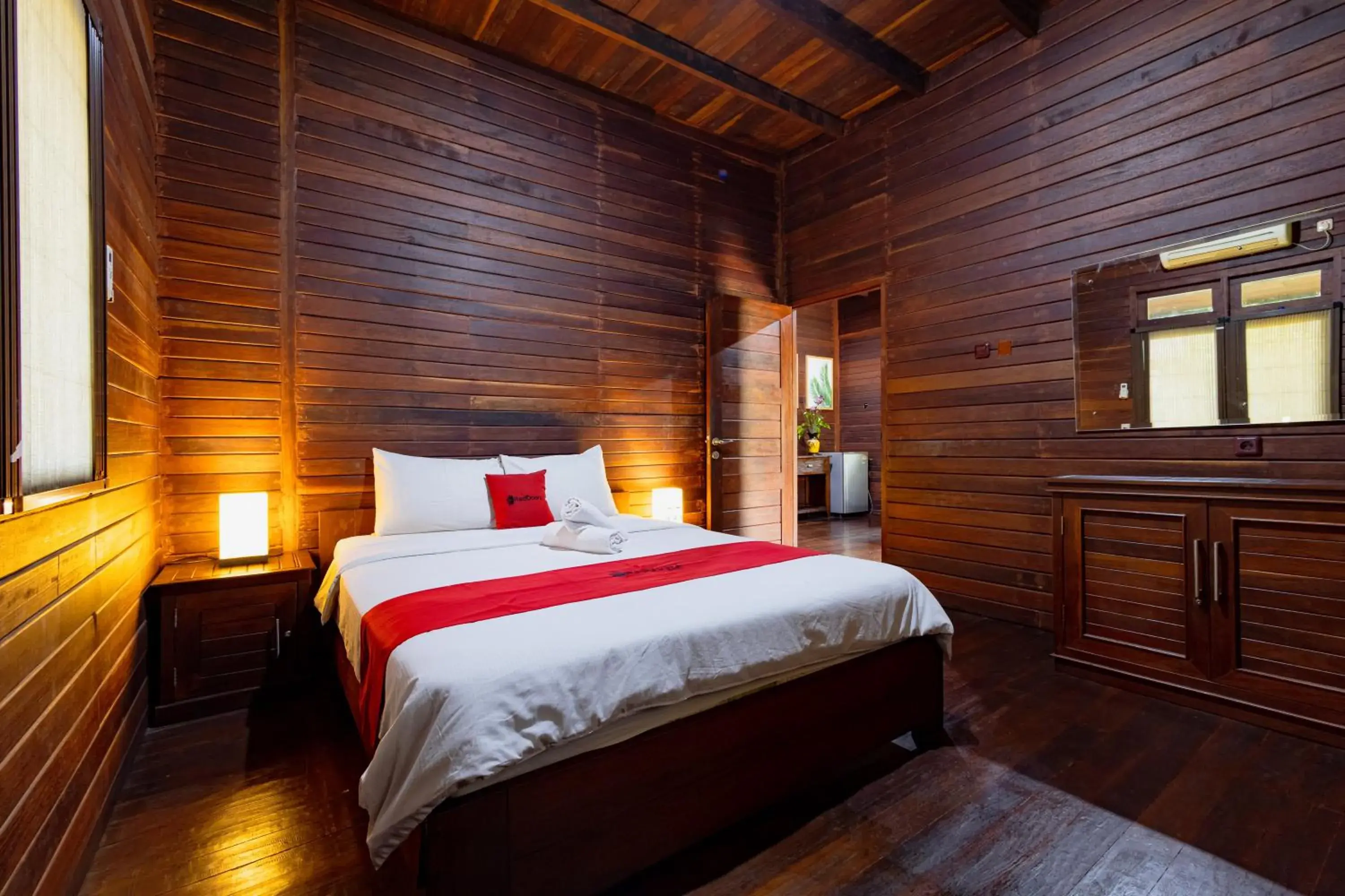 Bedroom, Bed in RedDoorz Resort @ Taman Wisata Mangrove