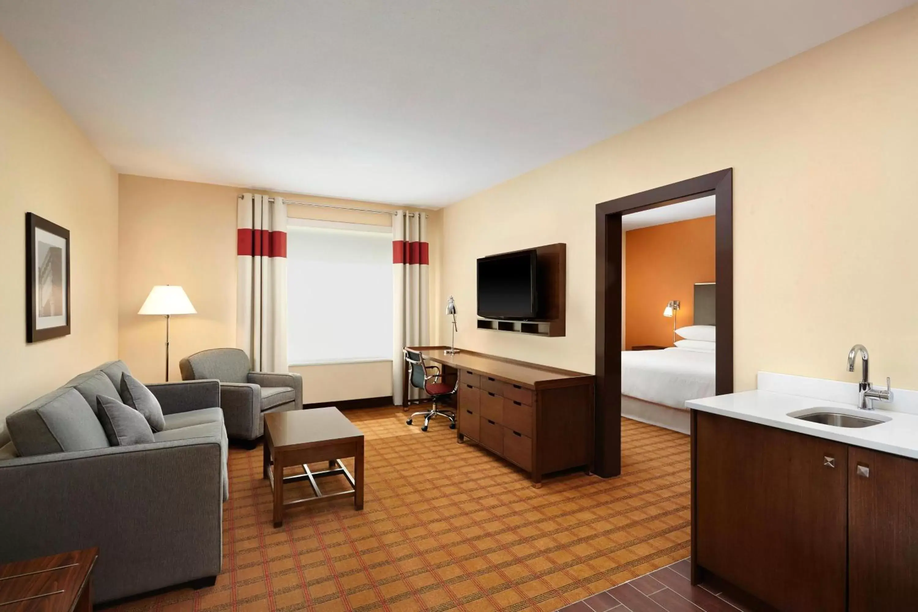 Bedroom, Seating Area in Four Points by Sheraton Edmonton International Airport