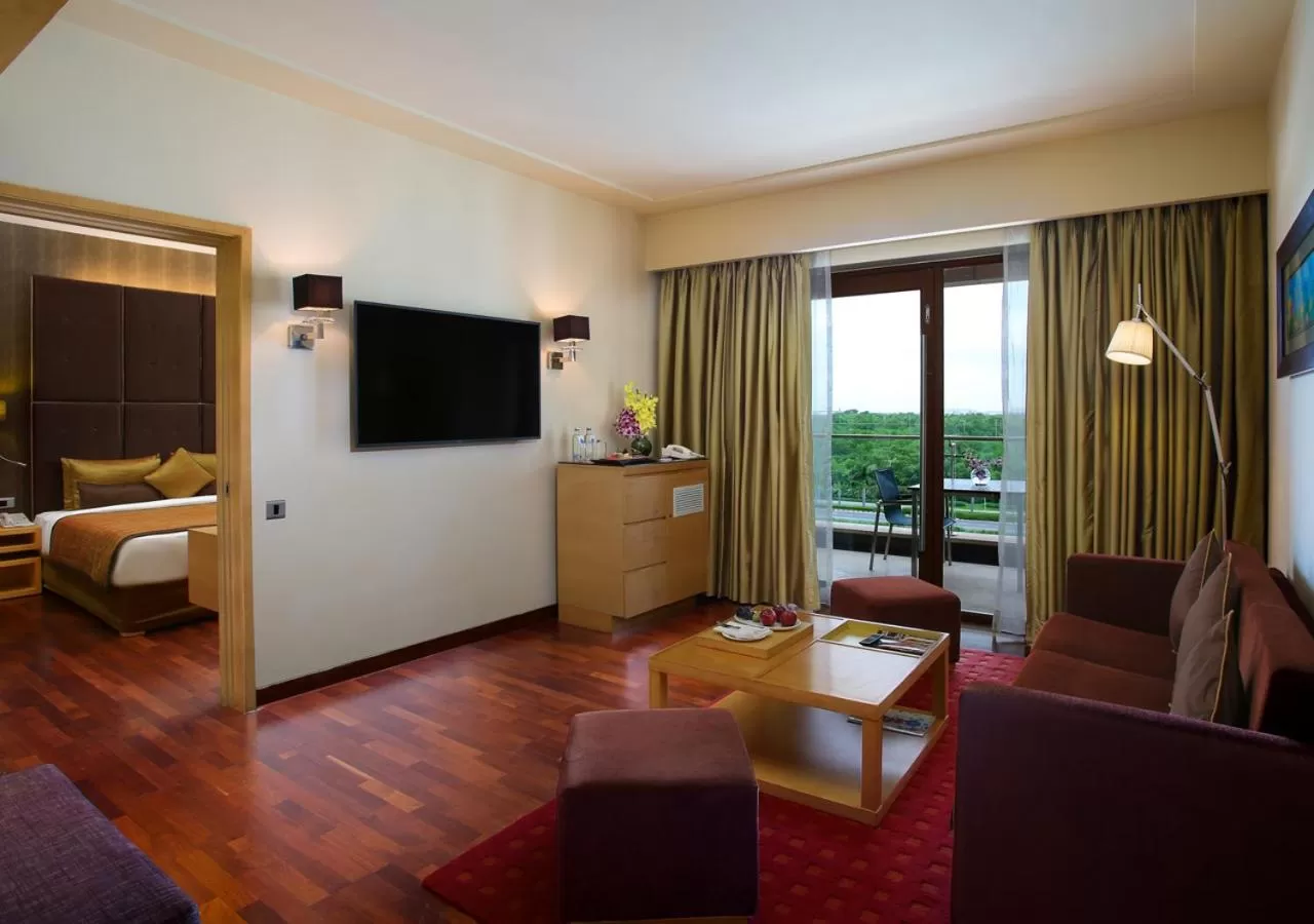 Living room, Bed in Novotel Hyderabad Airport