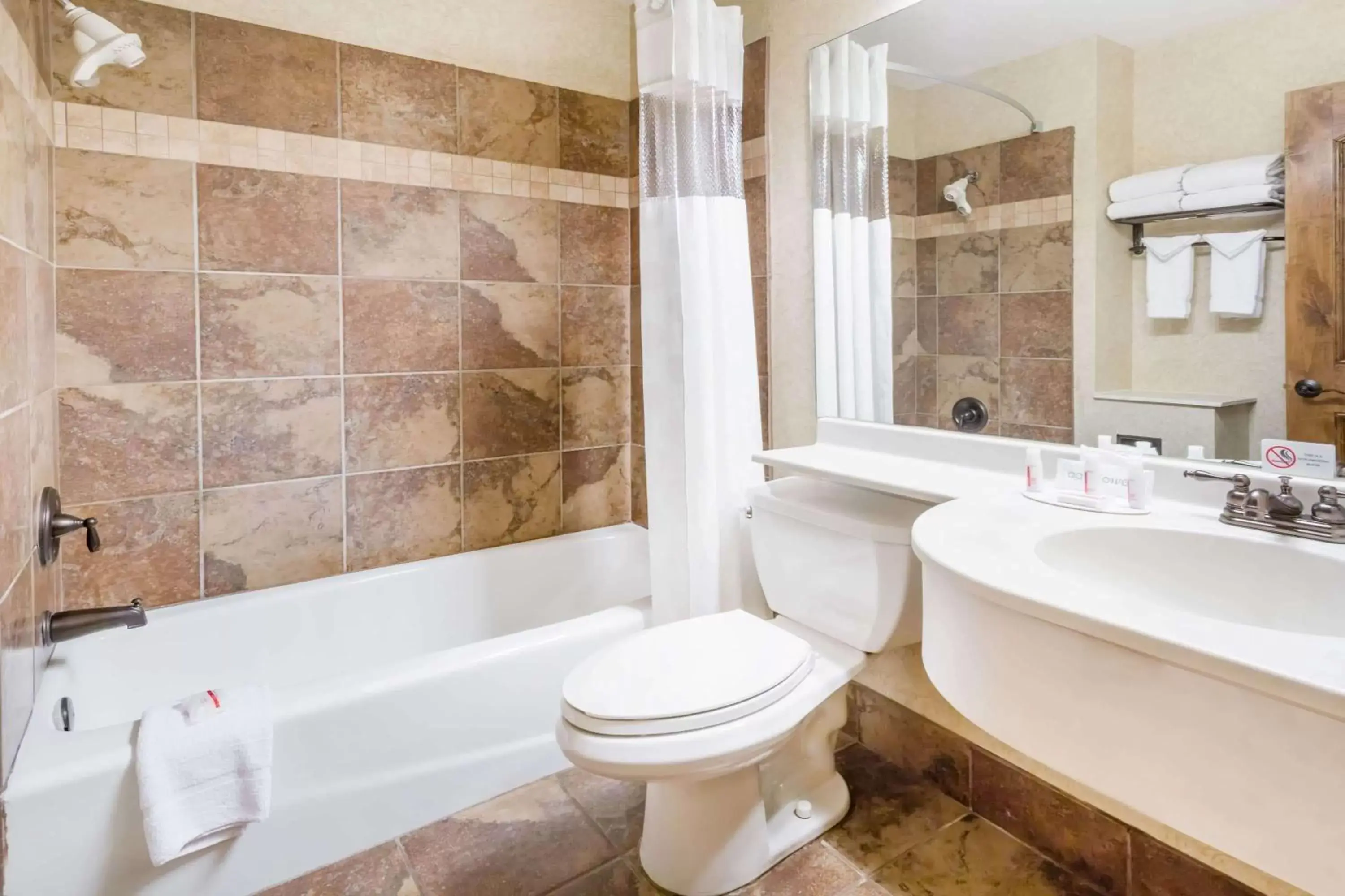 Bathroom in Ramada by Wyndham Frisco