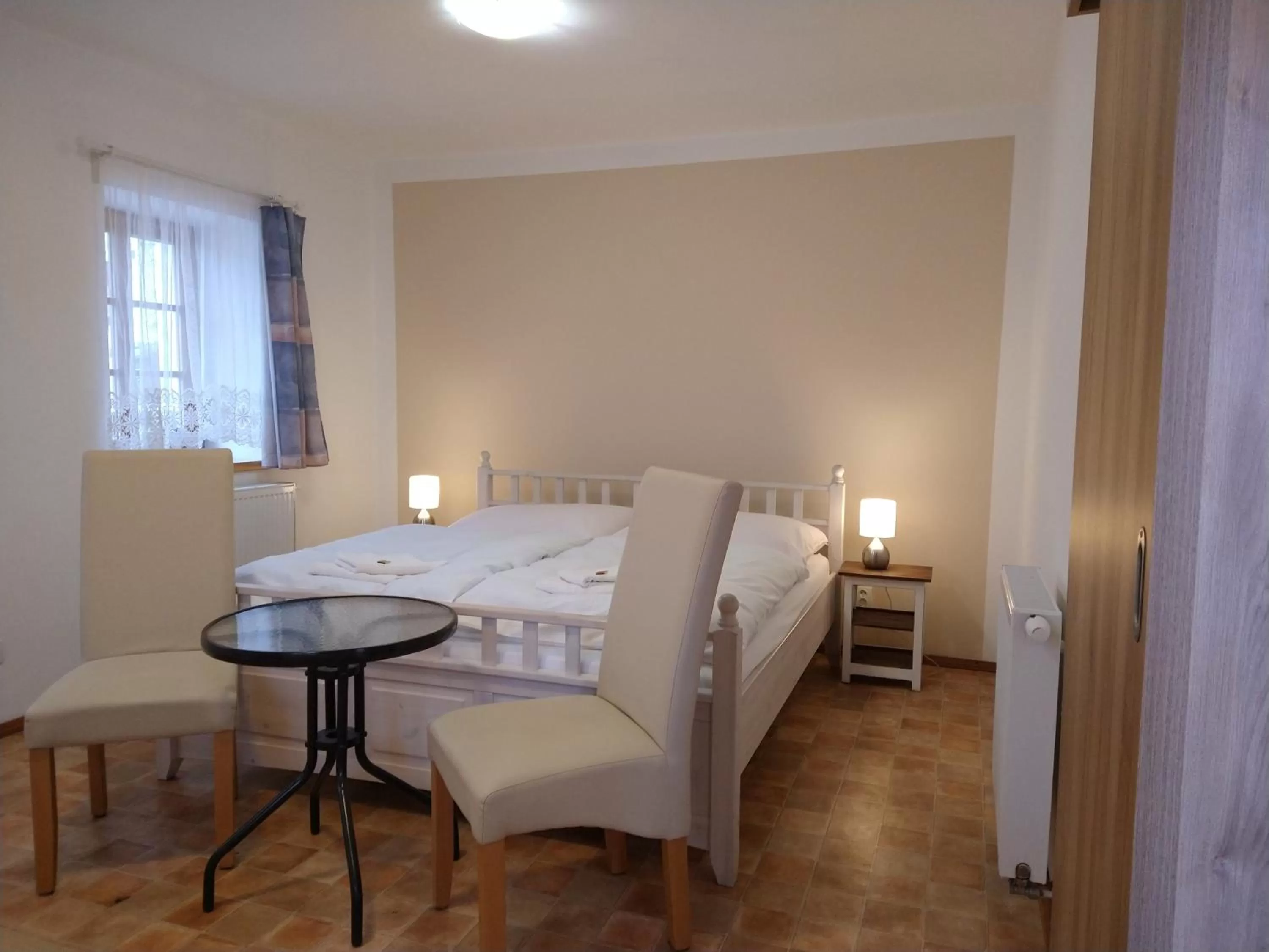 Seating area, Bed in Apartmány Malý mnich