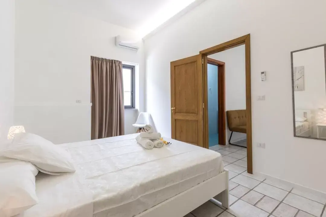 Bed in La Gemma del Salento Rooms&Apartments