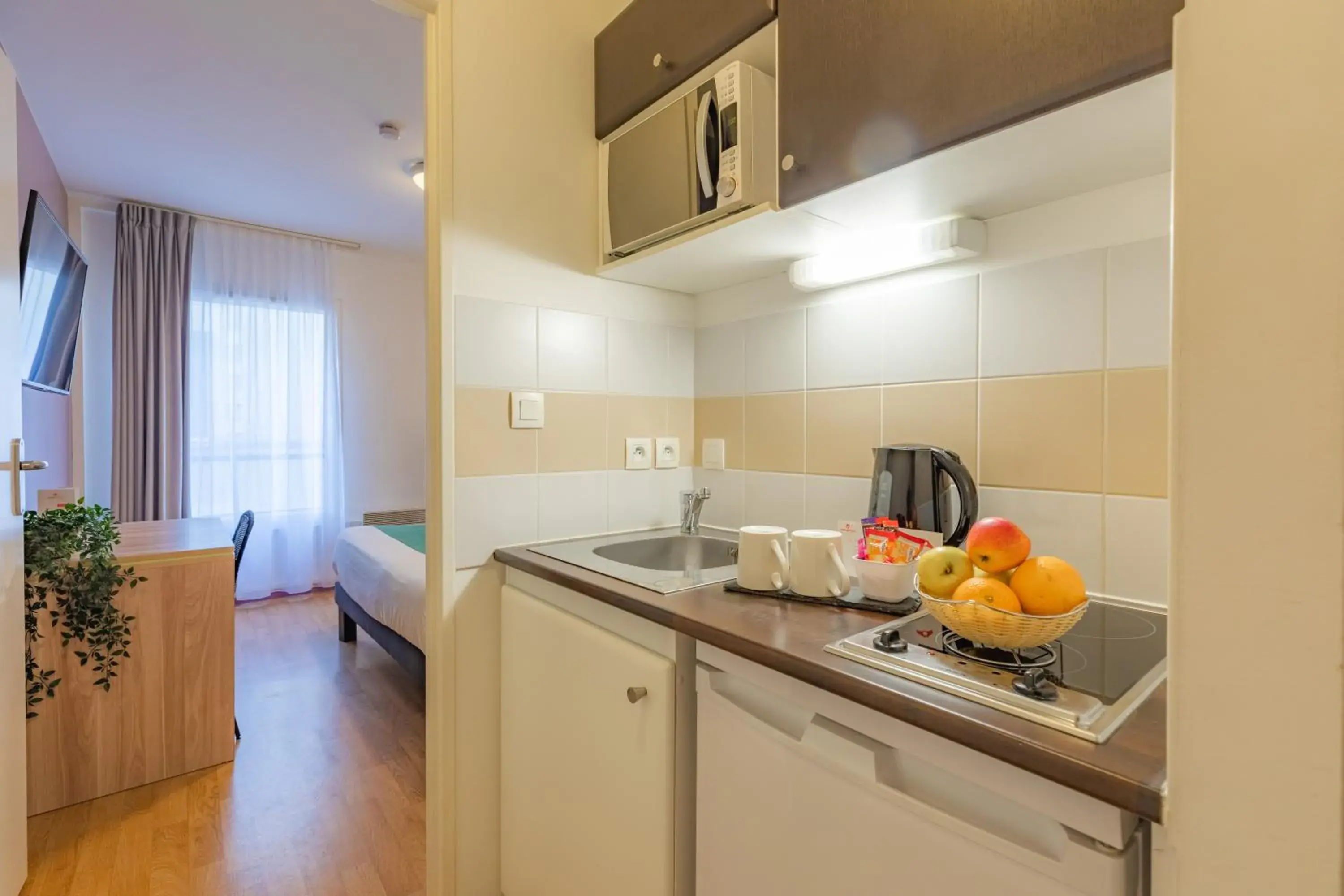 kitchen, Kitchen/Kitchenette in Park & Suites Elegance Nantes-Carre Bouffay