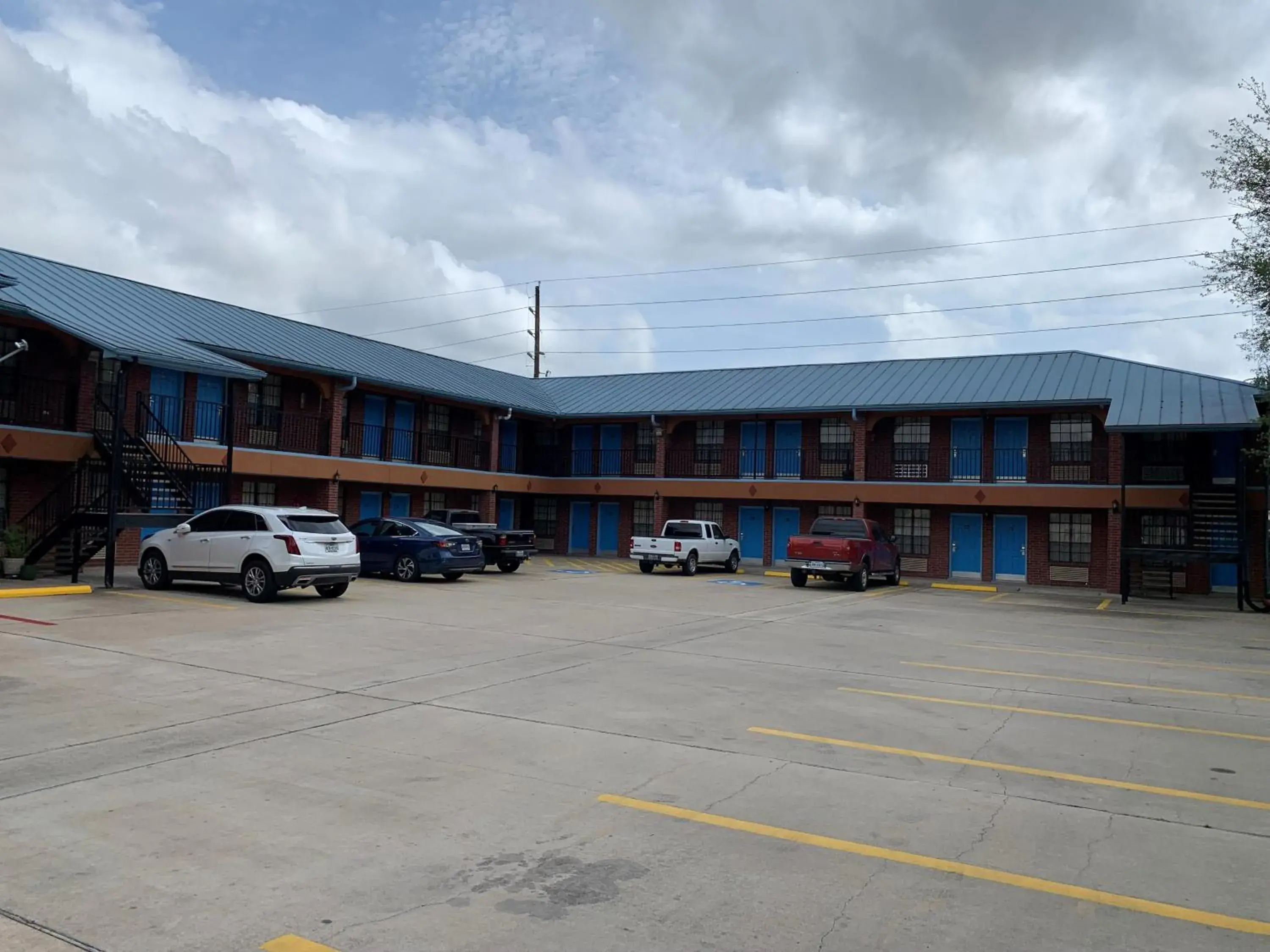 Parking, Property Building in Super 8 by Wyndham Houston West Katy