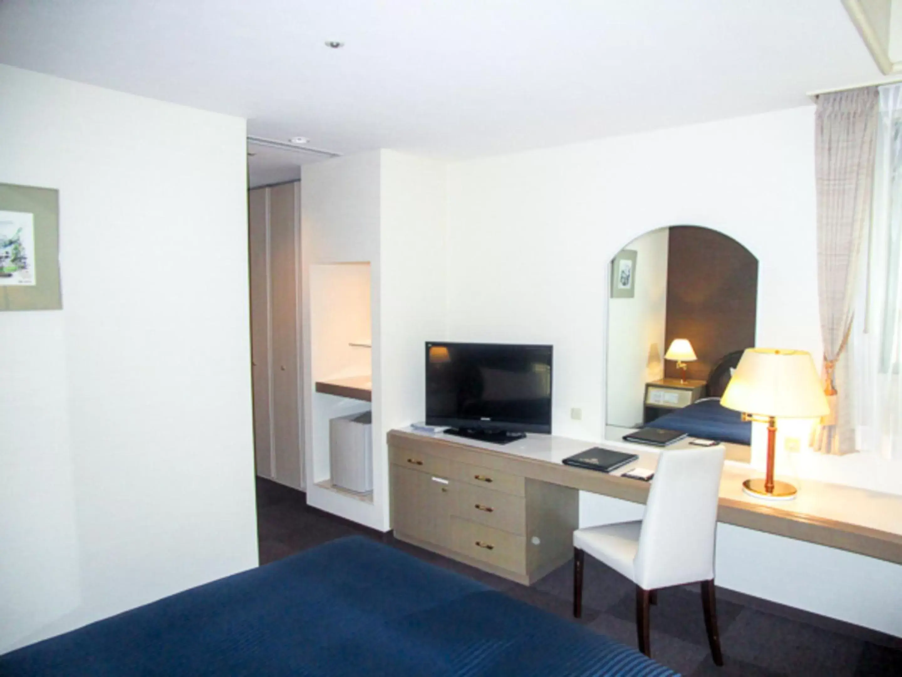 Photo of the whole room, TV/Entertainment Center in HOTEL LiVEMAX BUDGET SAPPORO