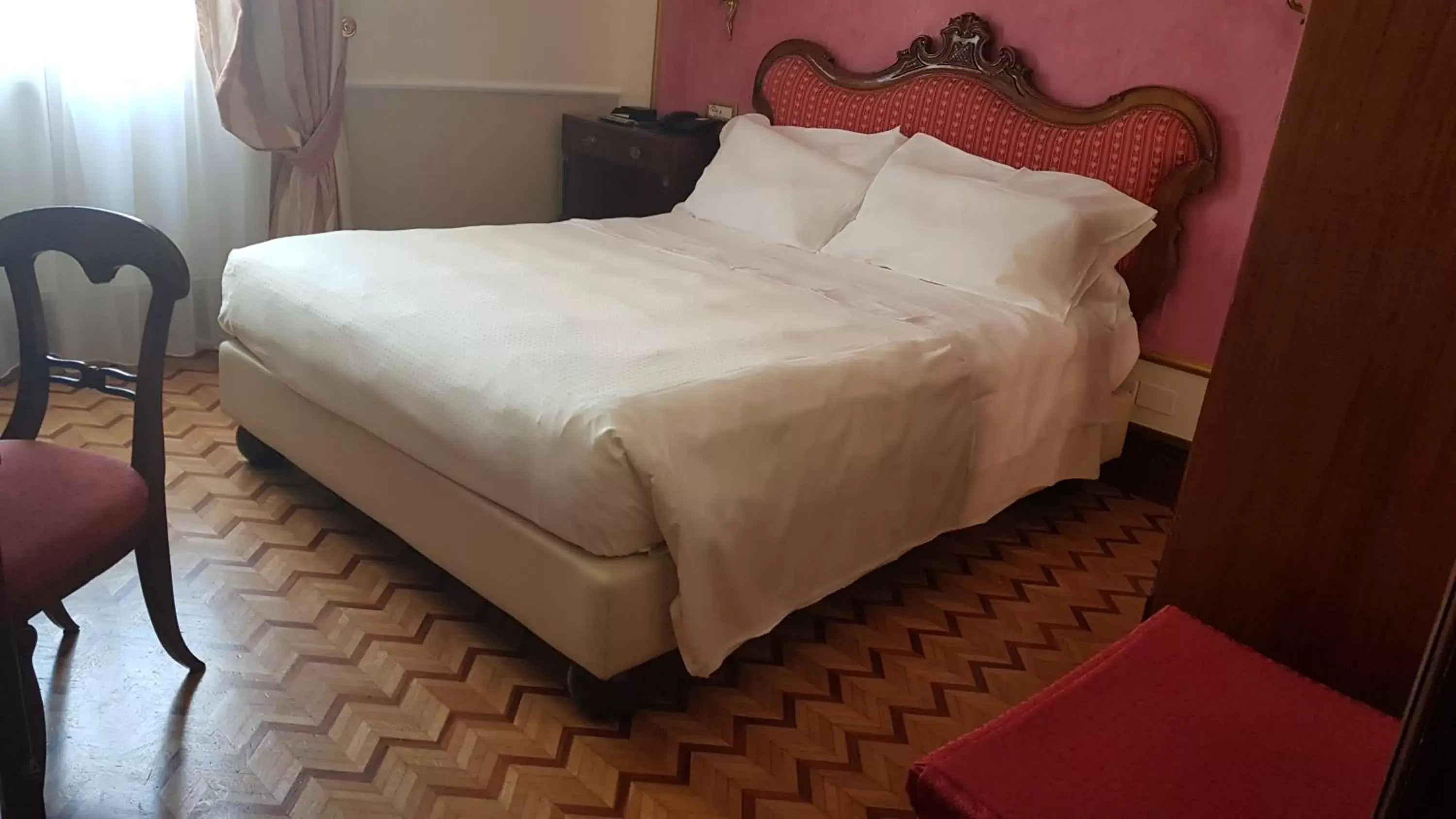 Bed in Due Torri Hotel