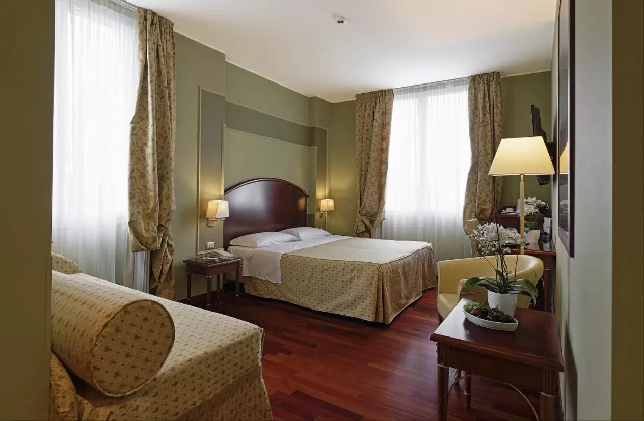 Bed in Savoia Hotel Regency