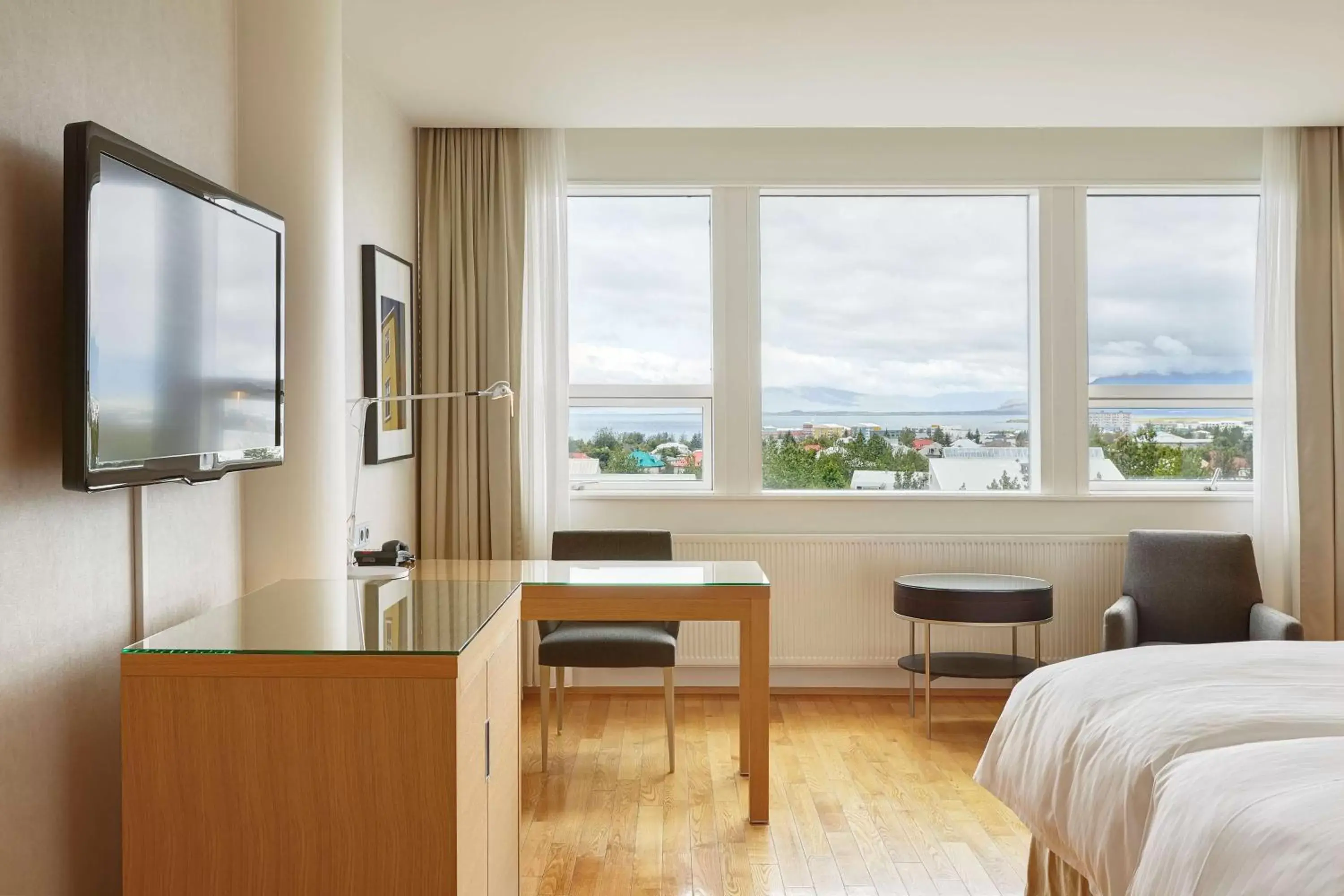 Bedroom, Seating Area in Hilton Reykjavik Nordica