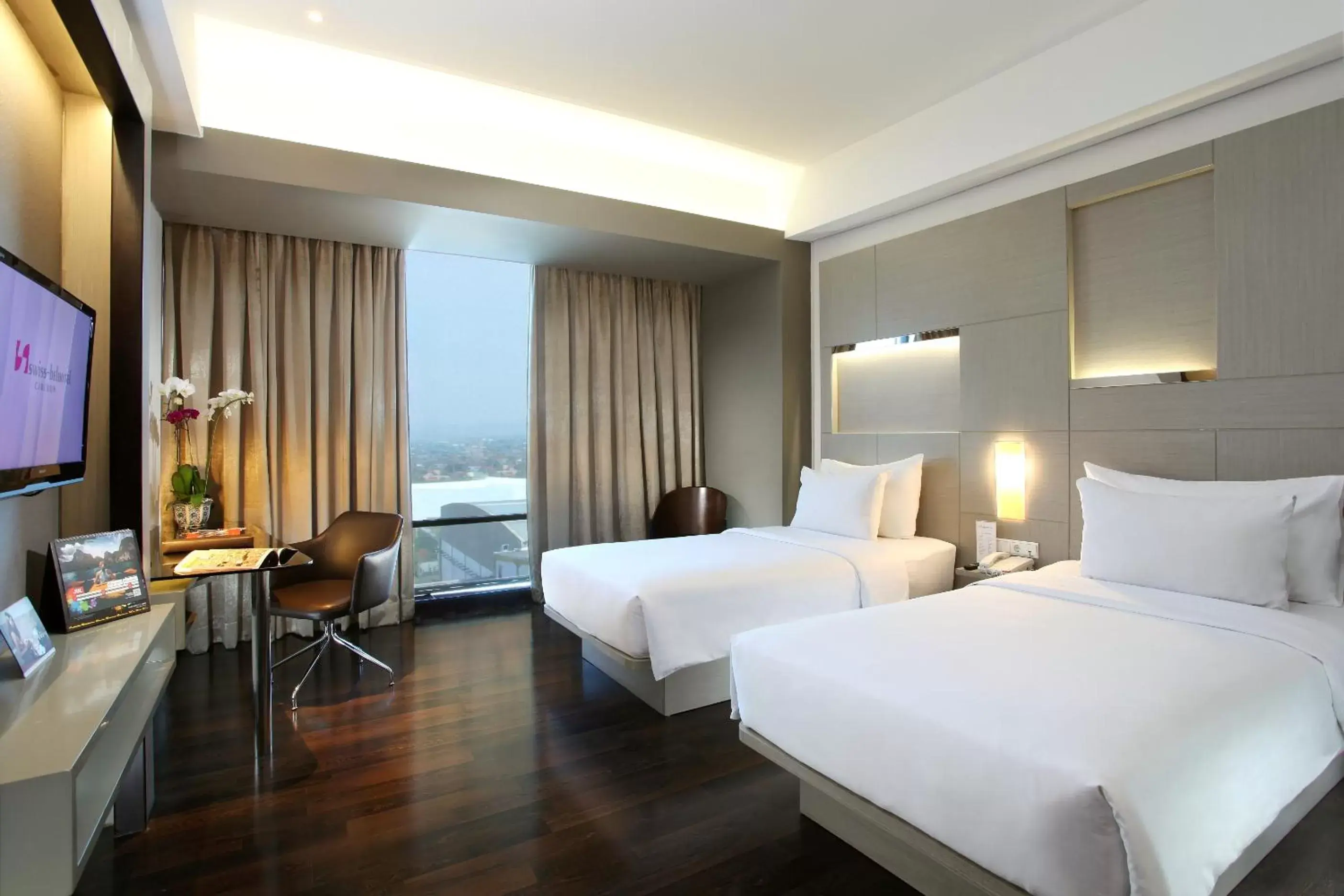 Bed in Swiss-Belhotel Cirebon