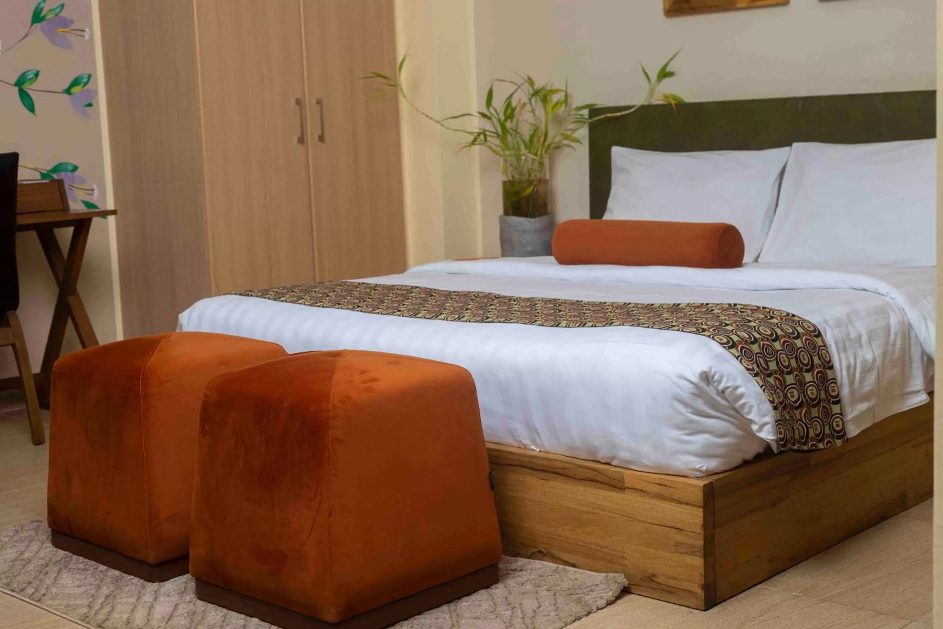 Bed in Roots Hotel Apartment