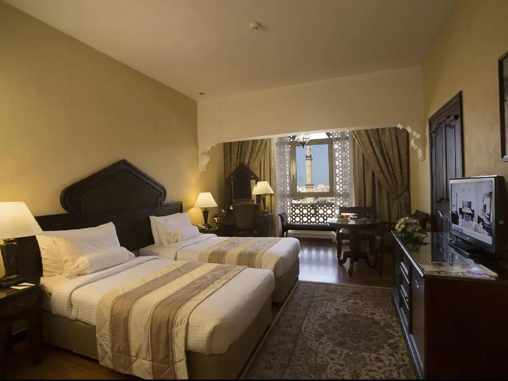 Bed in Arabian Courtyard Hotel & Spa