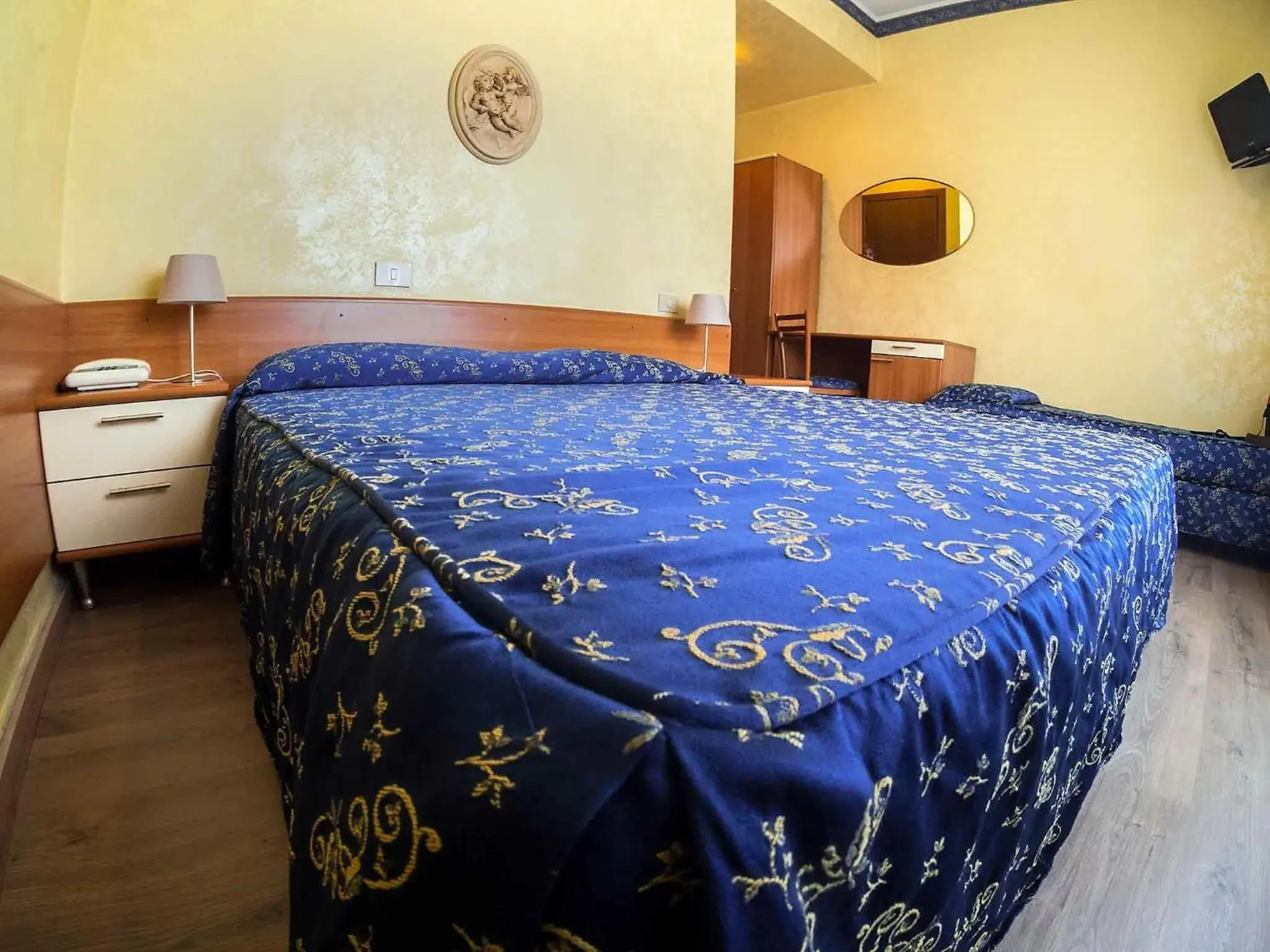 Bed in Albergo Dei Leoni