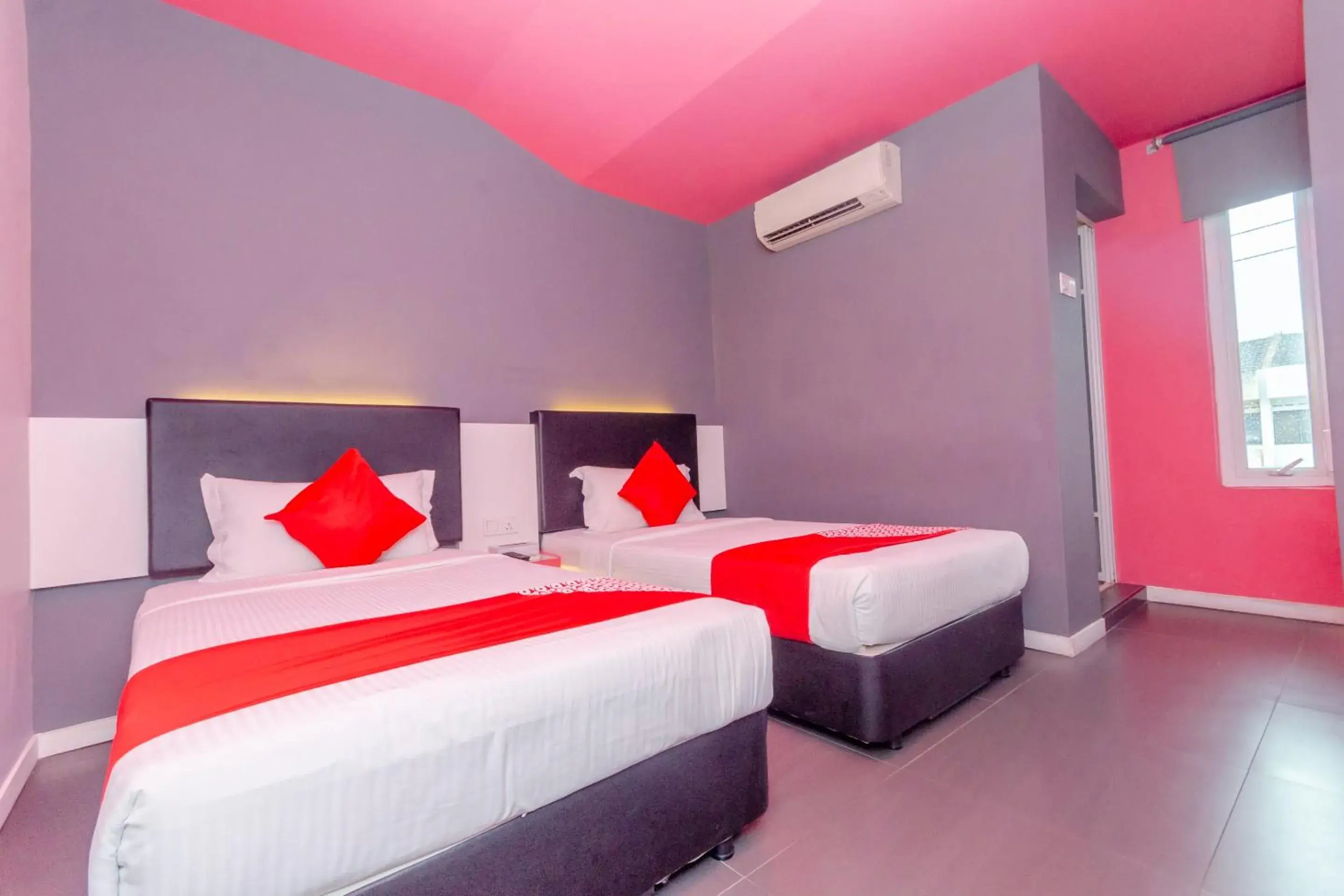 Bedroom, Bed in OYO 902 Rooms Boutique Hotel