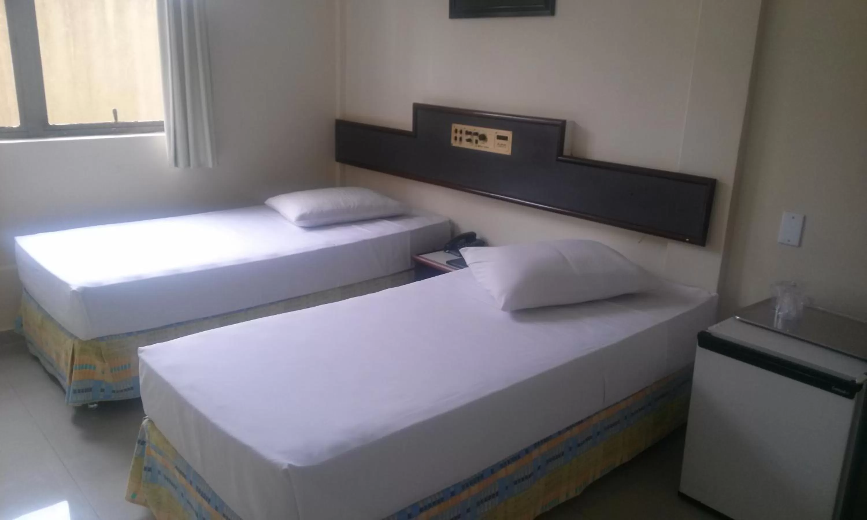 Bed in Hotel Estação Express