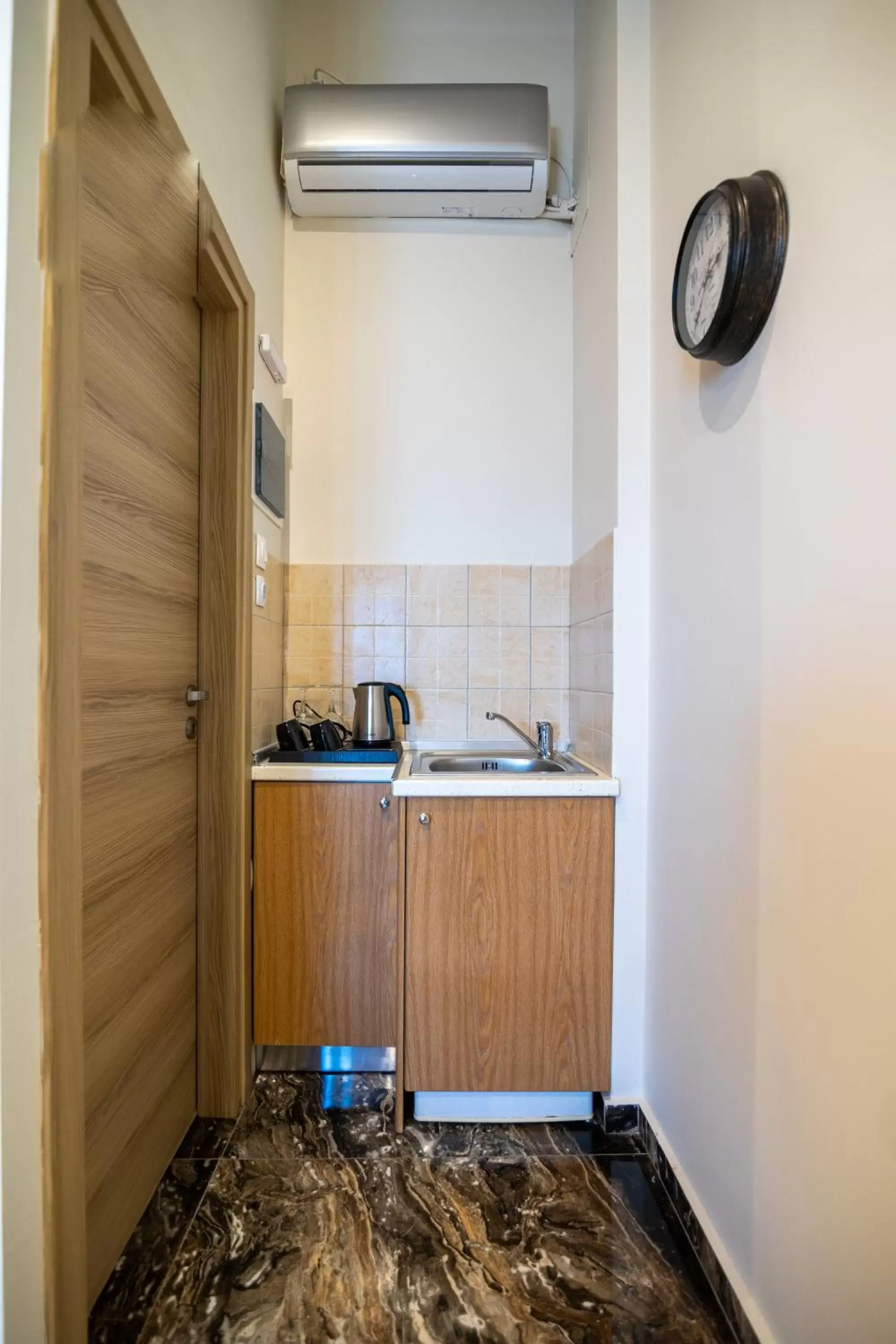 air conditioner, Kitchen/Kitchenette in Votsalakia Hotel & Suites