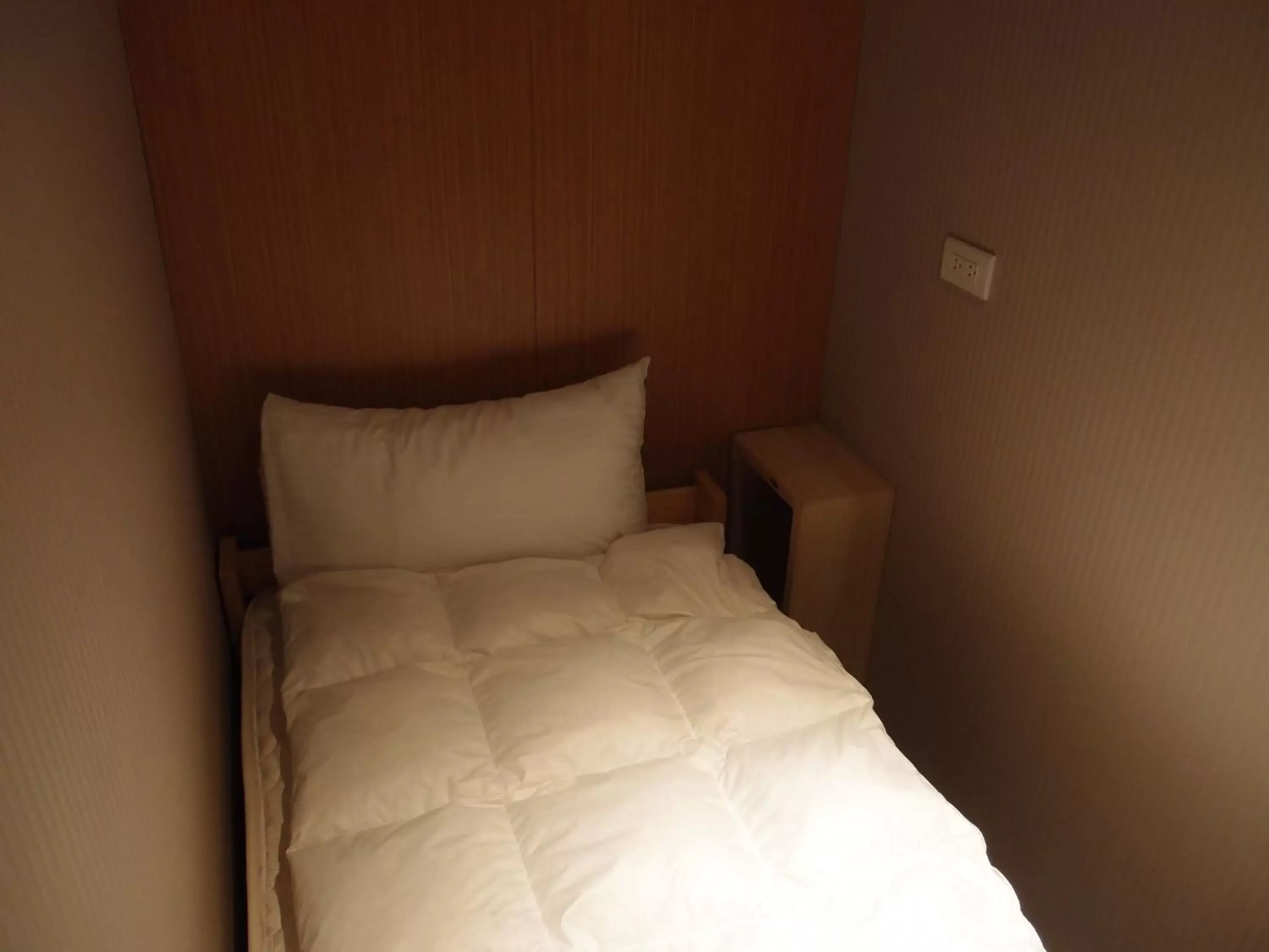 Bed in Bayman Hotel