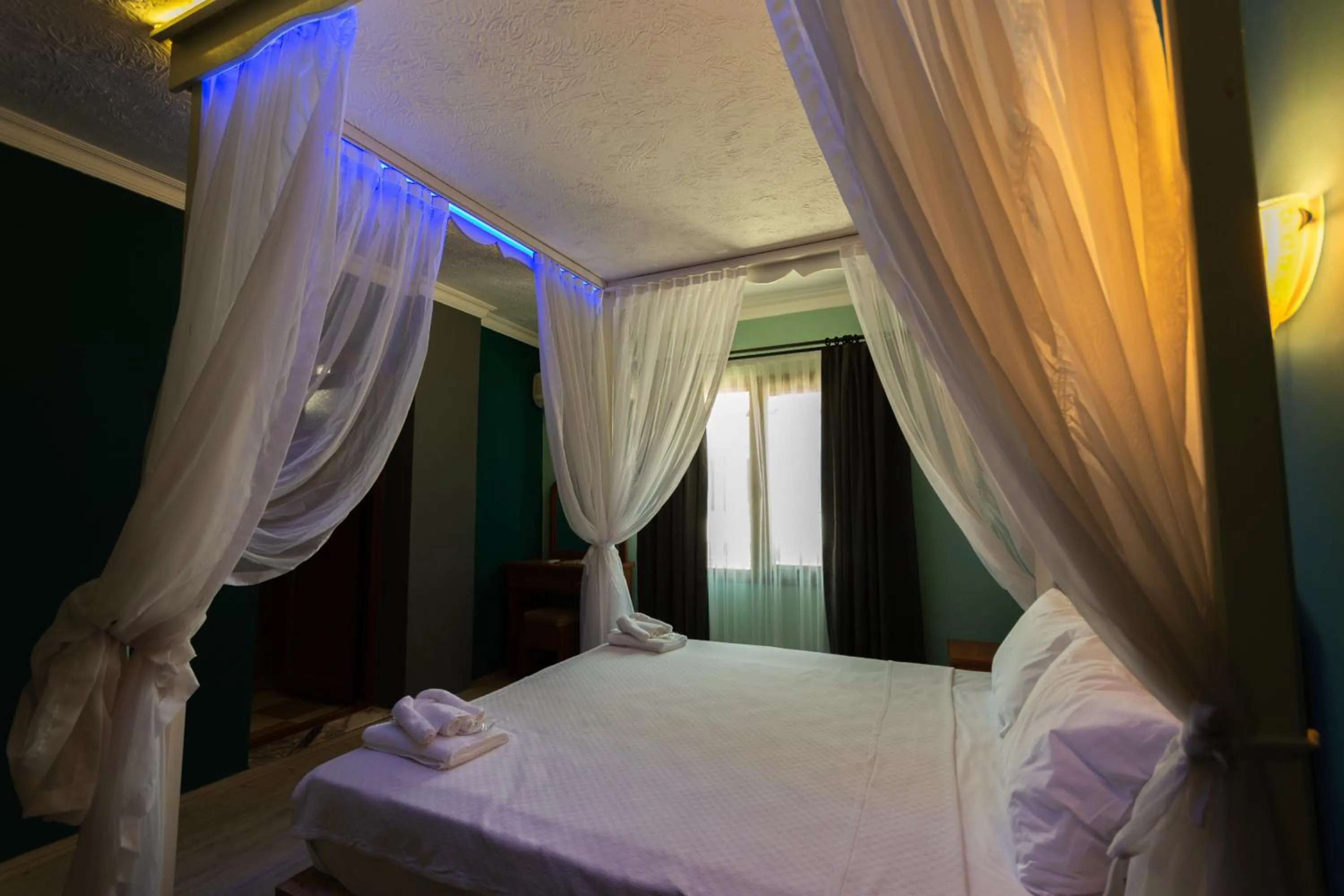 Bed in Rebetika Hotel & bistro