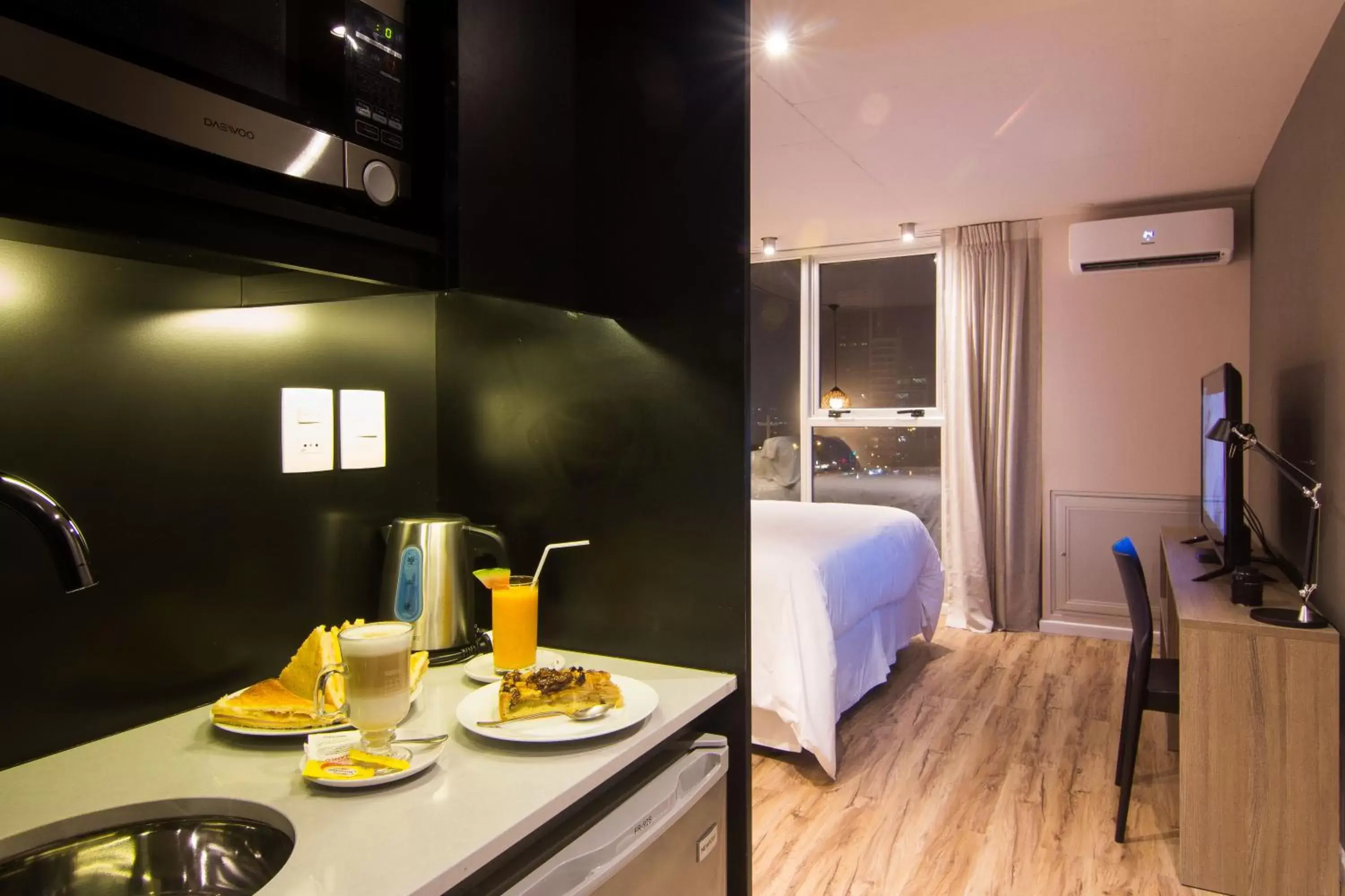 Kitchen or kitchenette in Hotel Ciudadano Suites