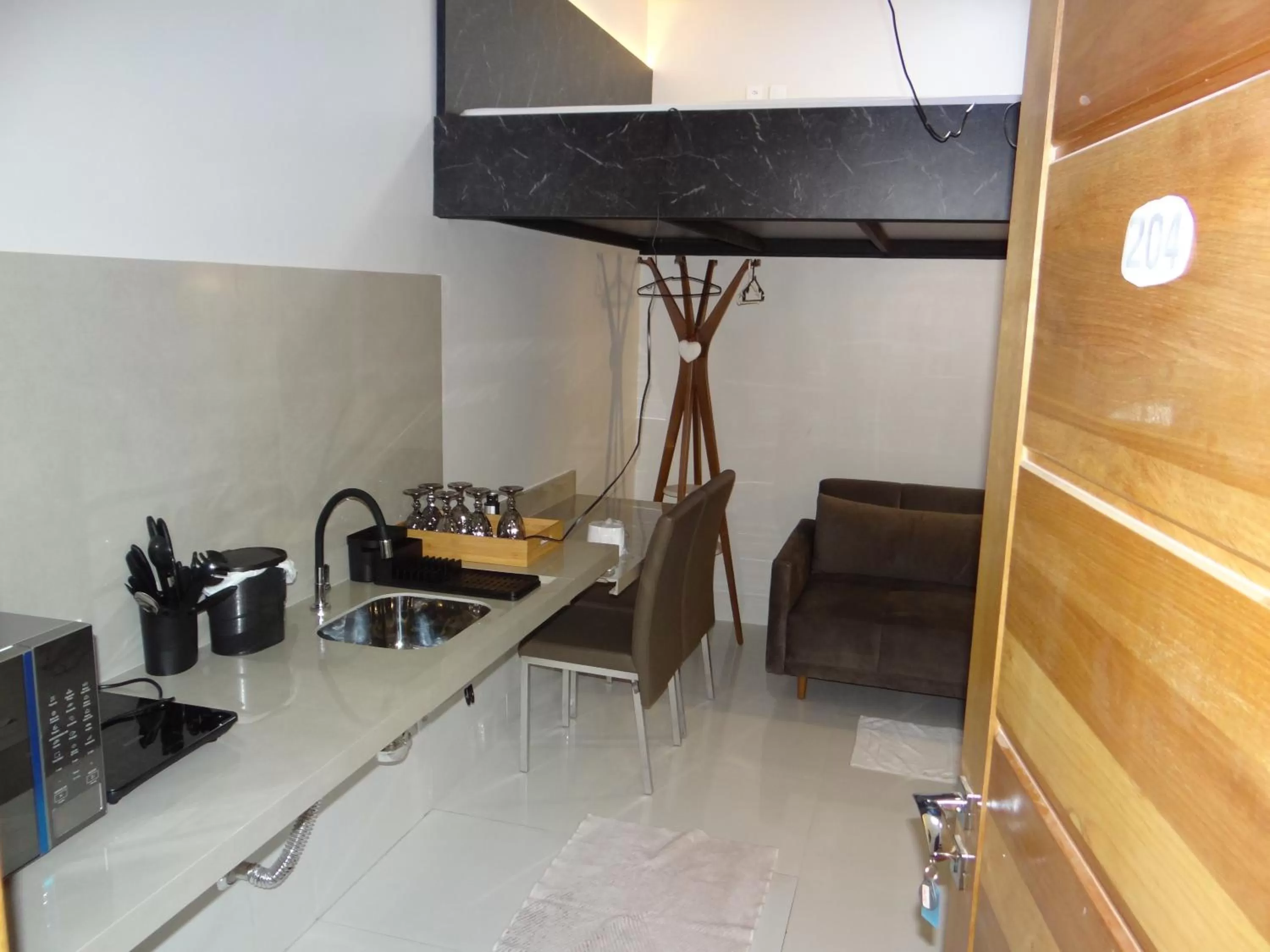 Kitchen/Kitchenette in ZANI APART HOTEL 520i