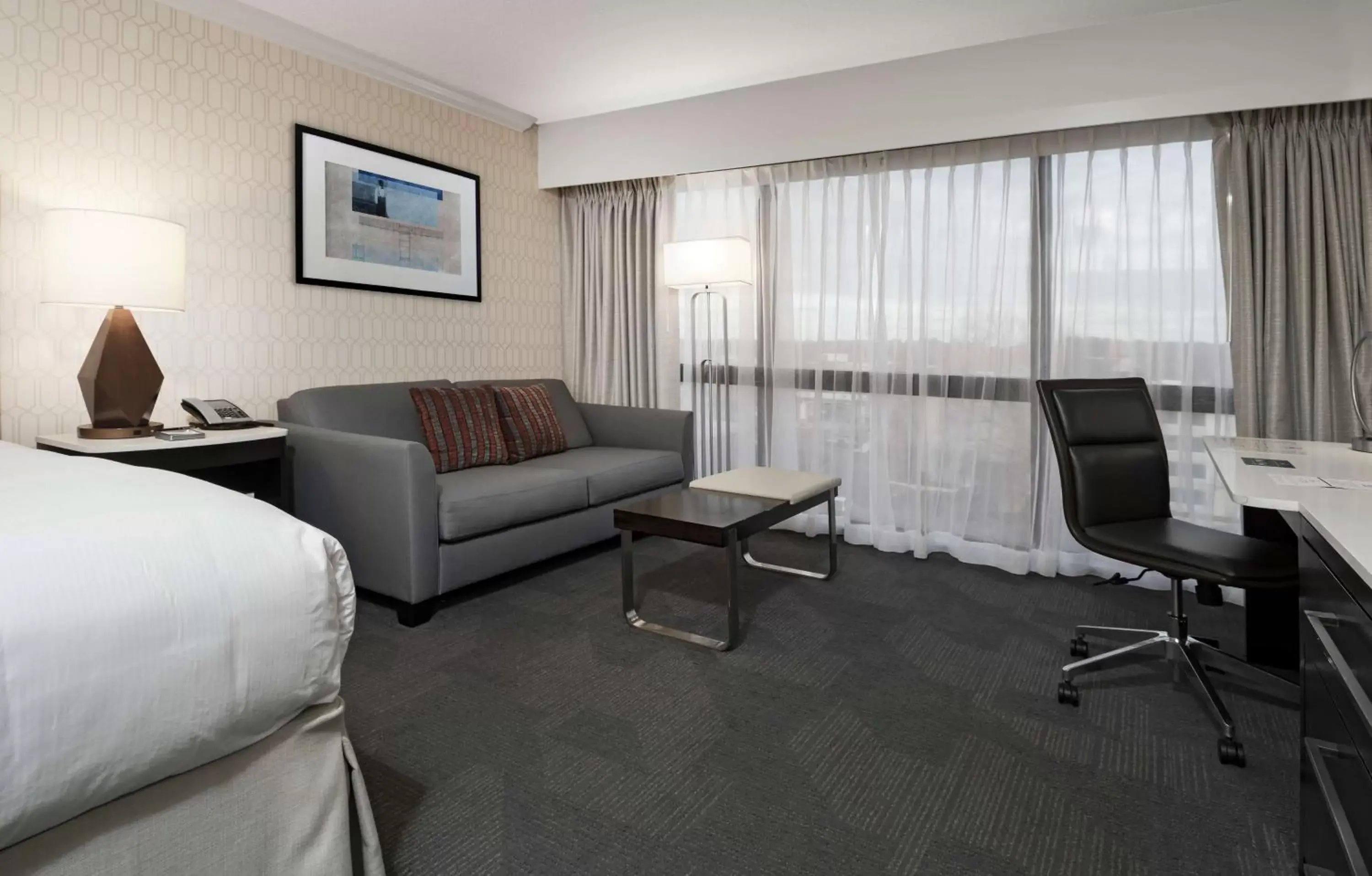 Bedroom, Seating Area in Hilton Greenville