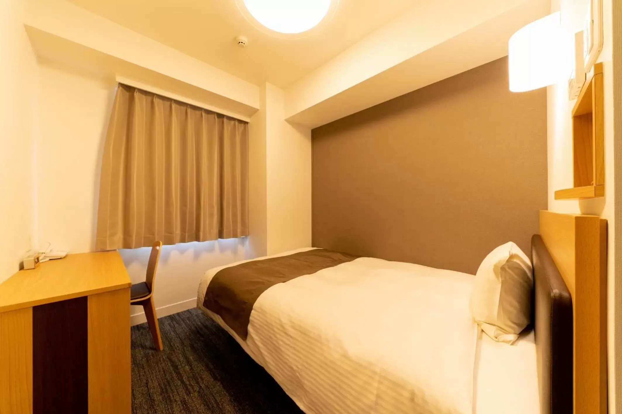 Bed in Pearl Hotel Shinjuku Akebonobashi Bed in Pearl Hotel Shinjuku Akebonobashi