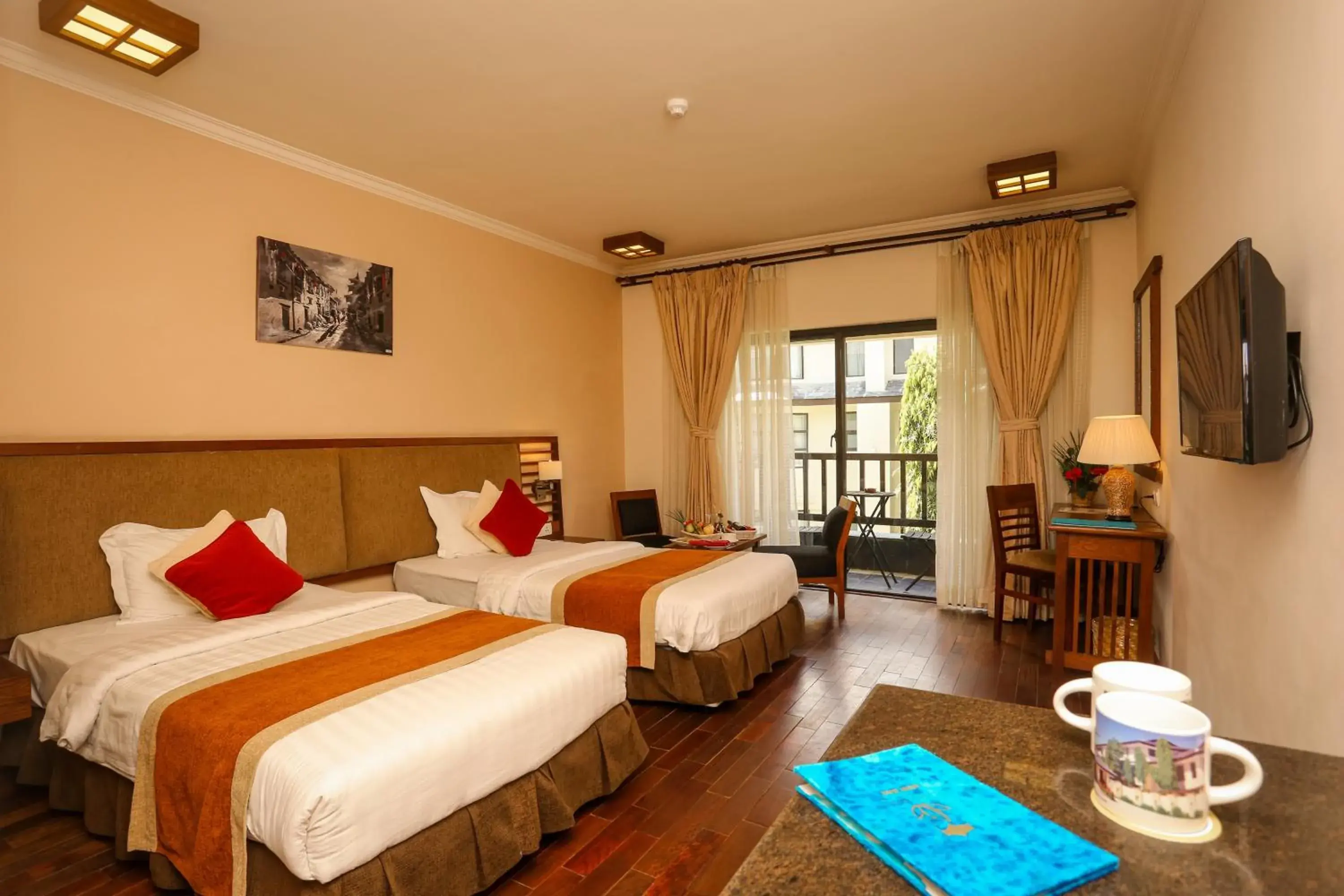 Bed in Atithi Resort & Spa