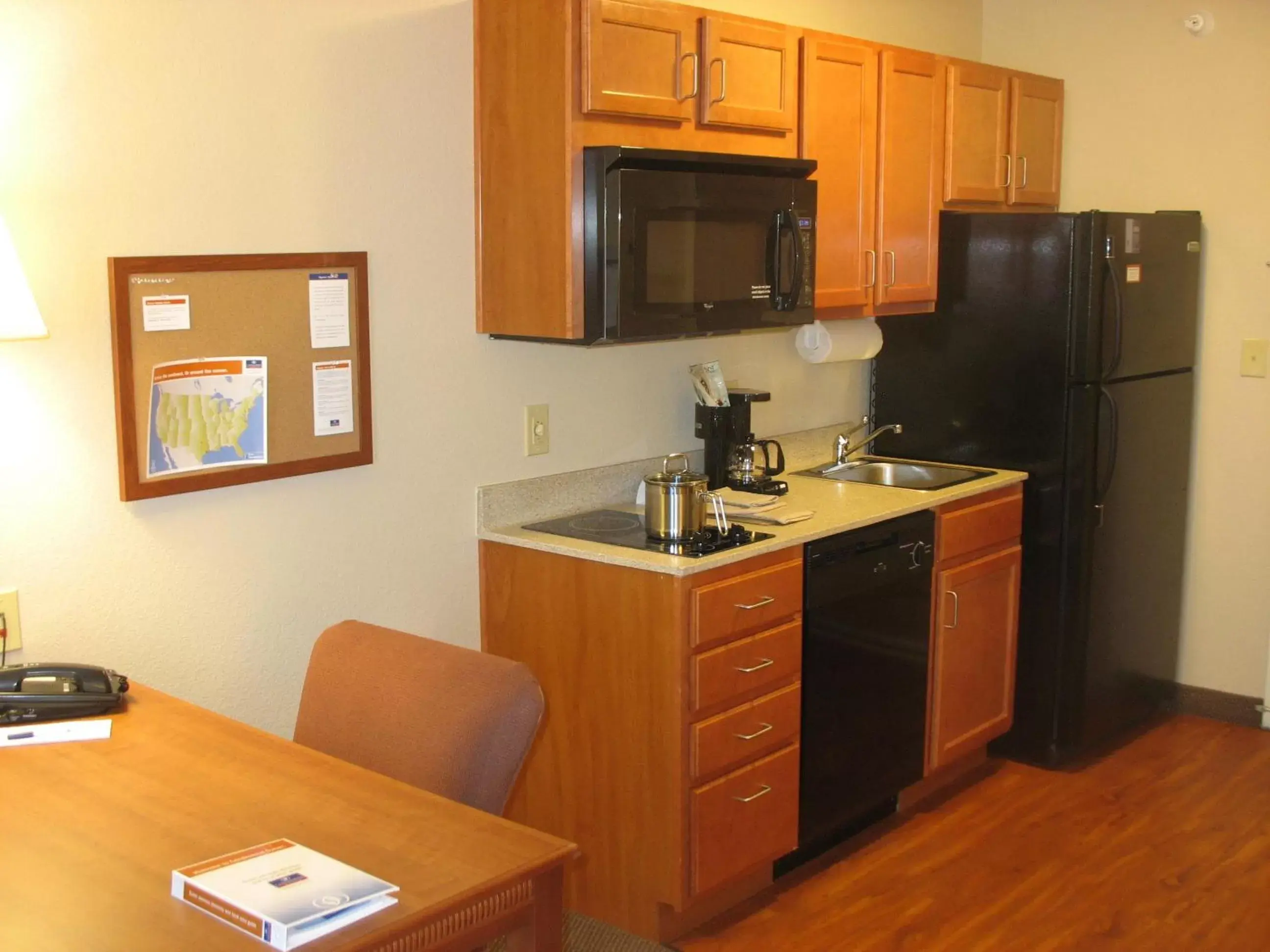 Photo of the whole room, Kitchen/Kitchenette in Candlewood Suites Indianapolis Northwest, an IHG Hotel