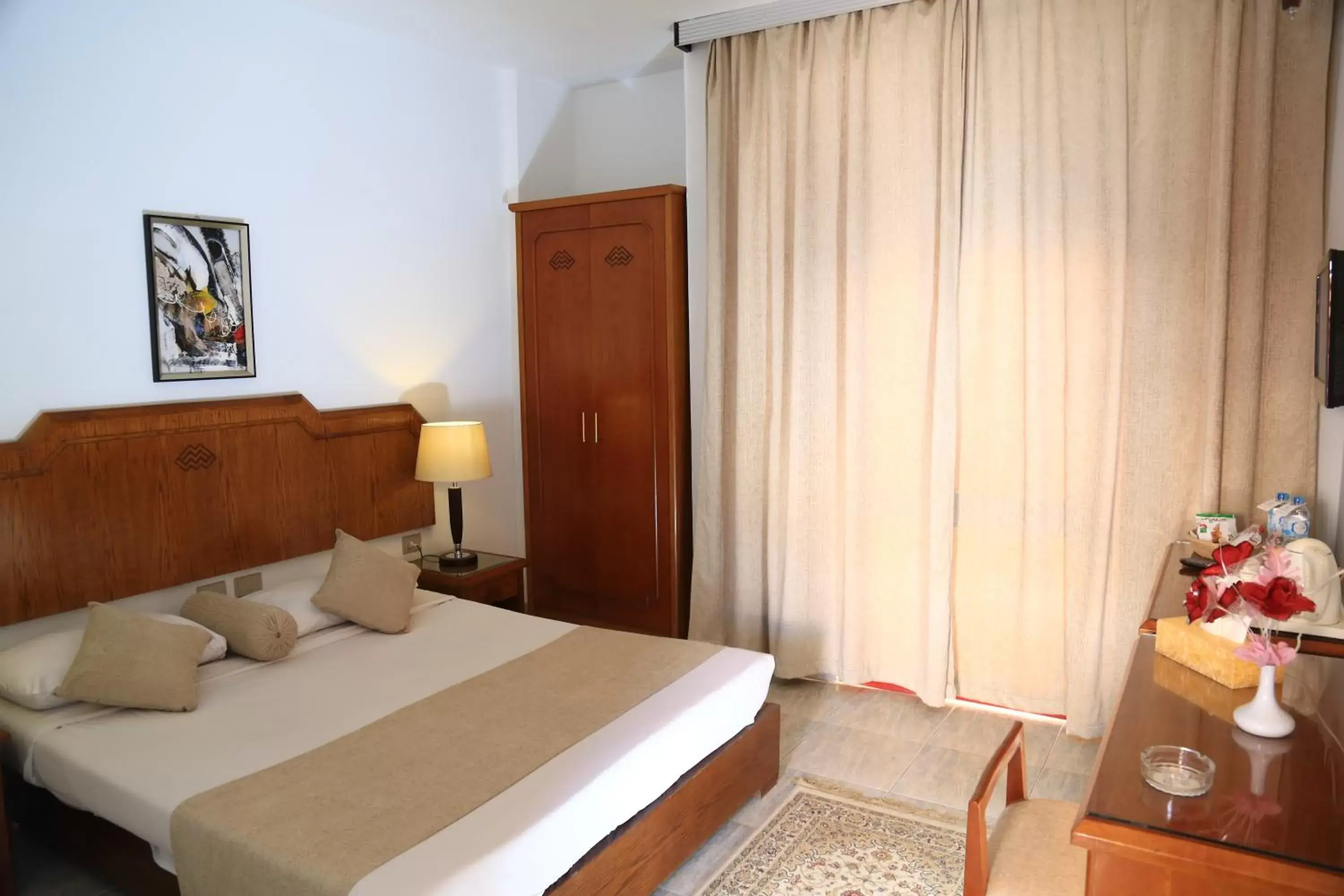 Bed in MinaMark Beach Resort for Families and Couples Only
