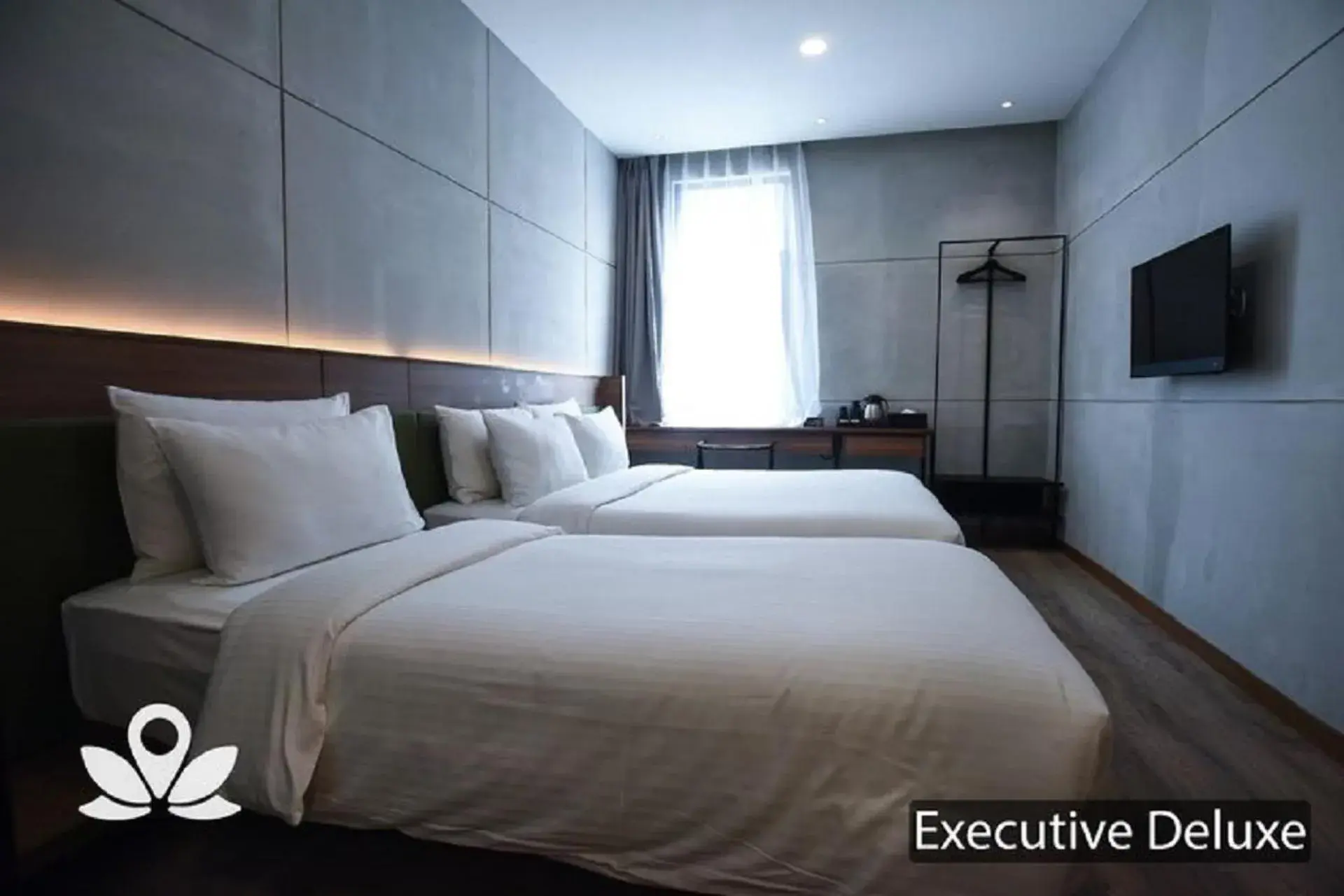 Bed in Ceria Hotel