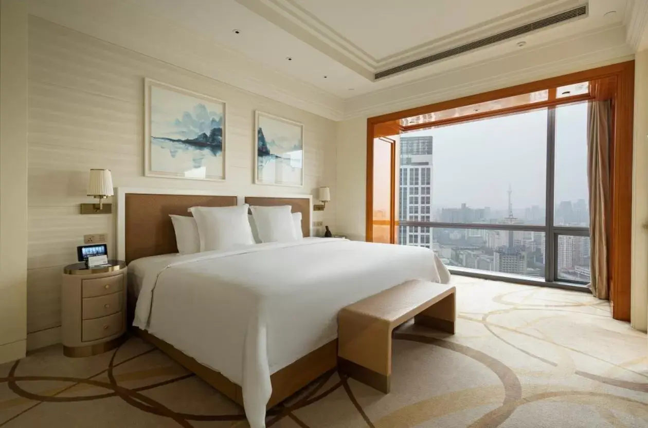 Bed in Four Seasons Hotel Tianjin