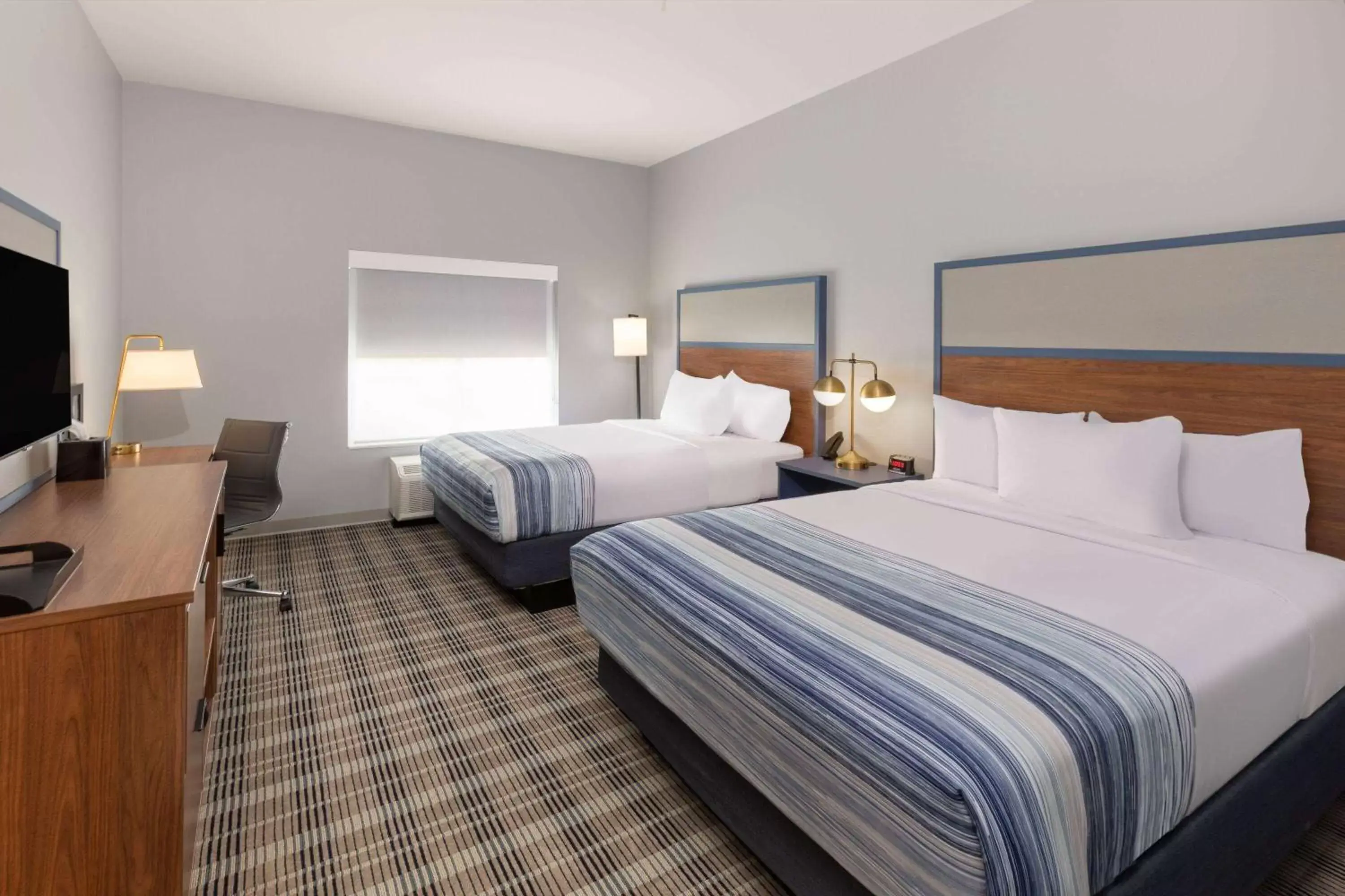 Photo of the whole room, Bed in AmericInn by Wyndham Mountain Home