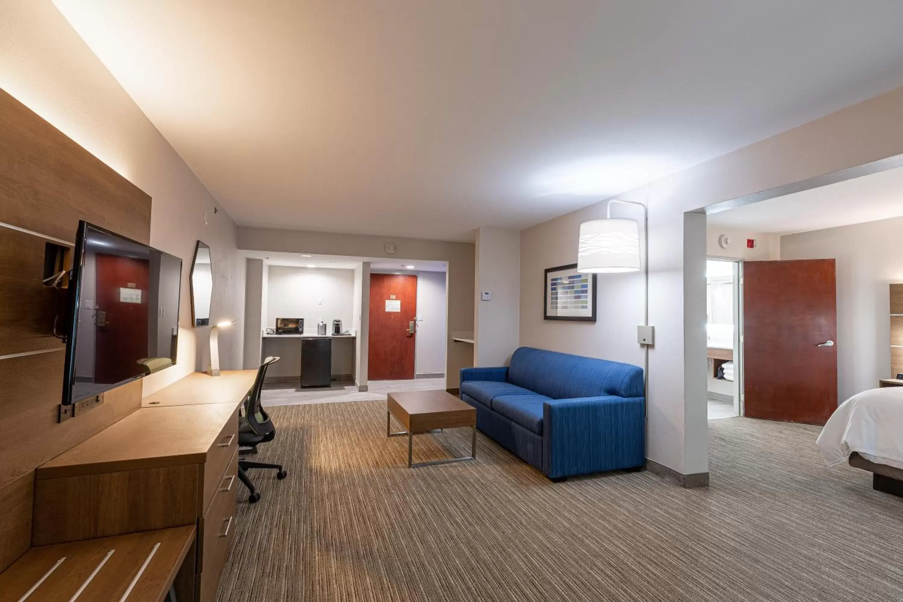 Photo of the whole room, Seating Area in Holiday Inn Express & Suites Arlington North – Stadium Area, an IHG Hotel