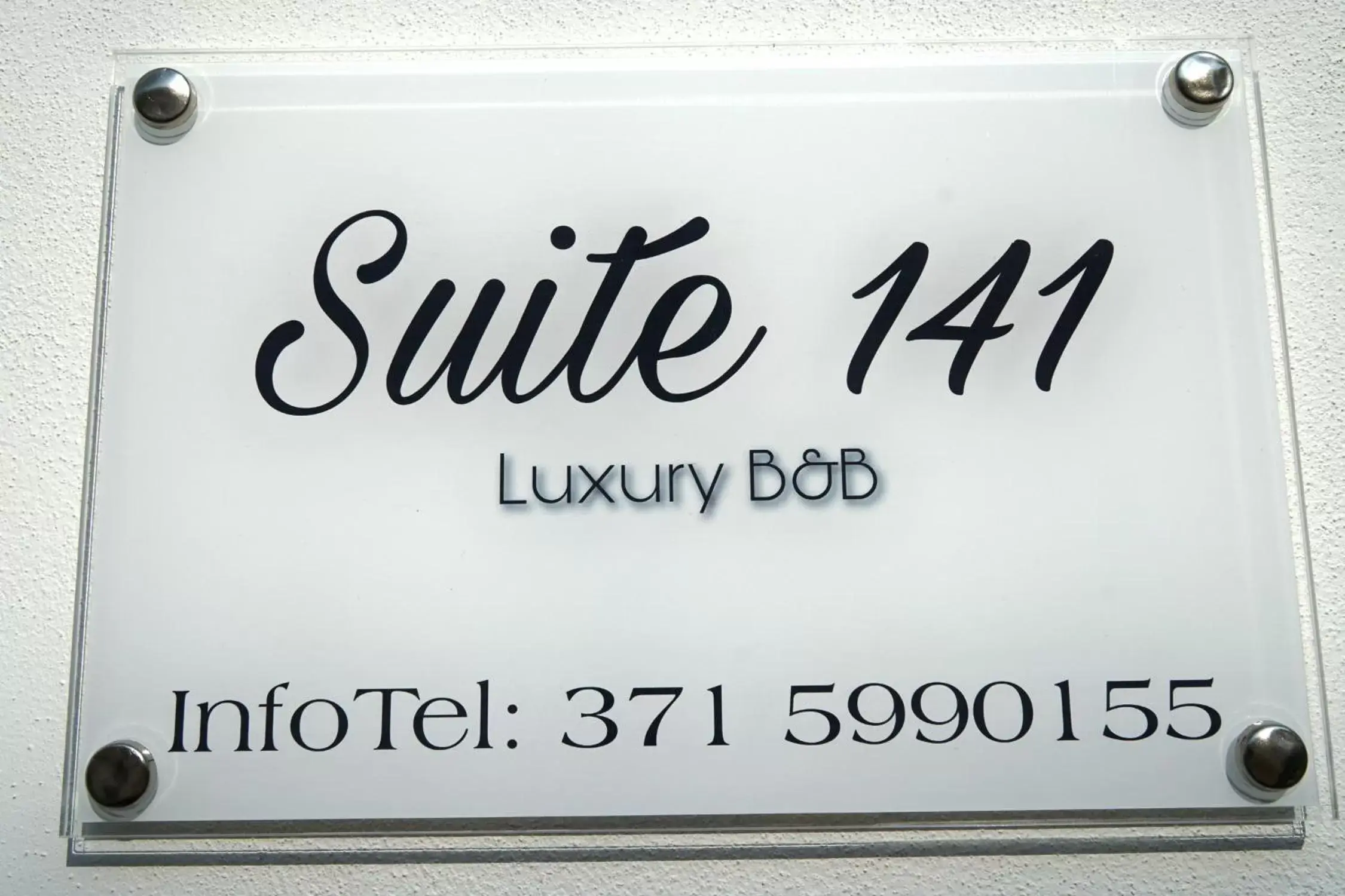 Property Logo/Sign in Suite 141 - Luxury B&B