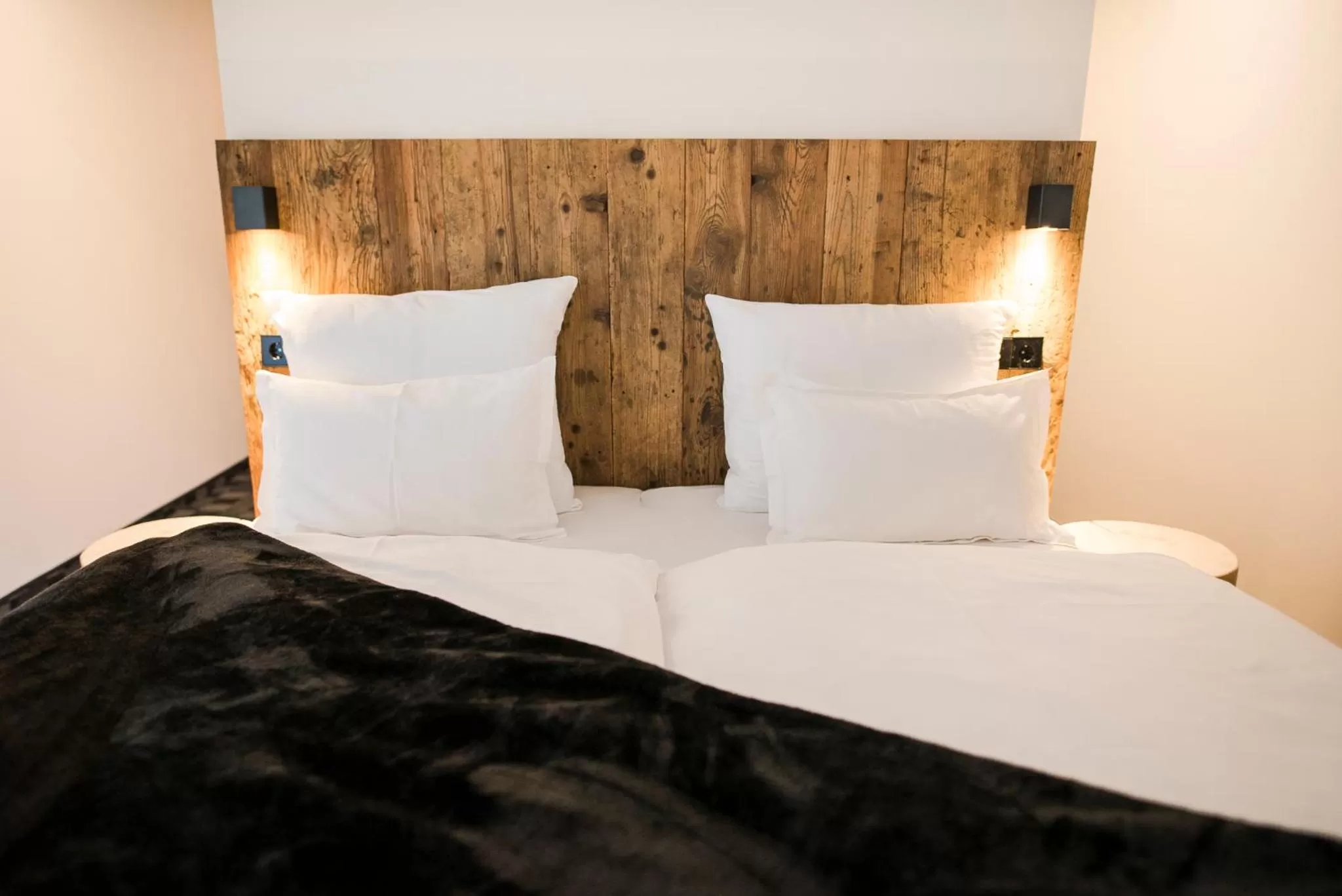 Bed in Garni Hotel Katzenthalerhof