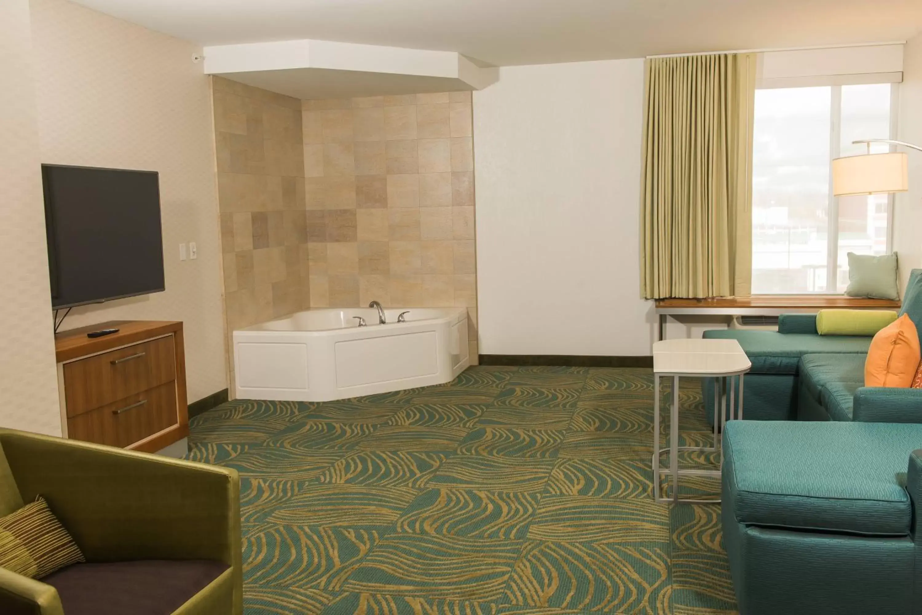 Swimming pool, Seating Area in SpringHill Suites by Marriott Buffalo Airport