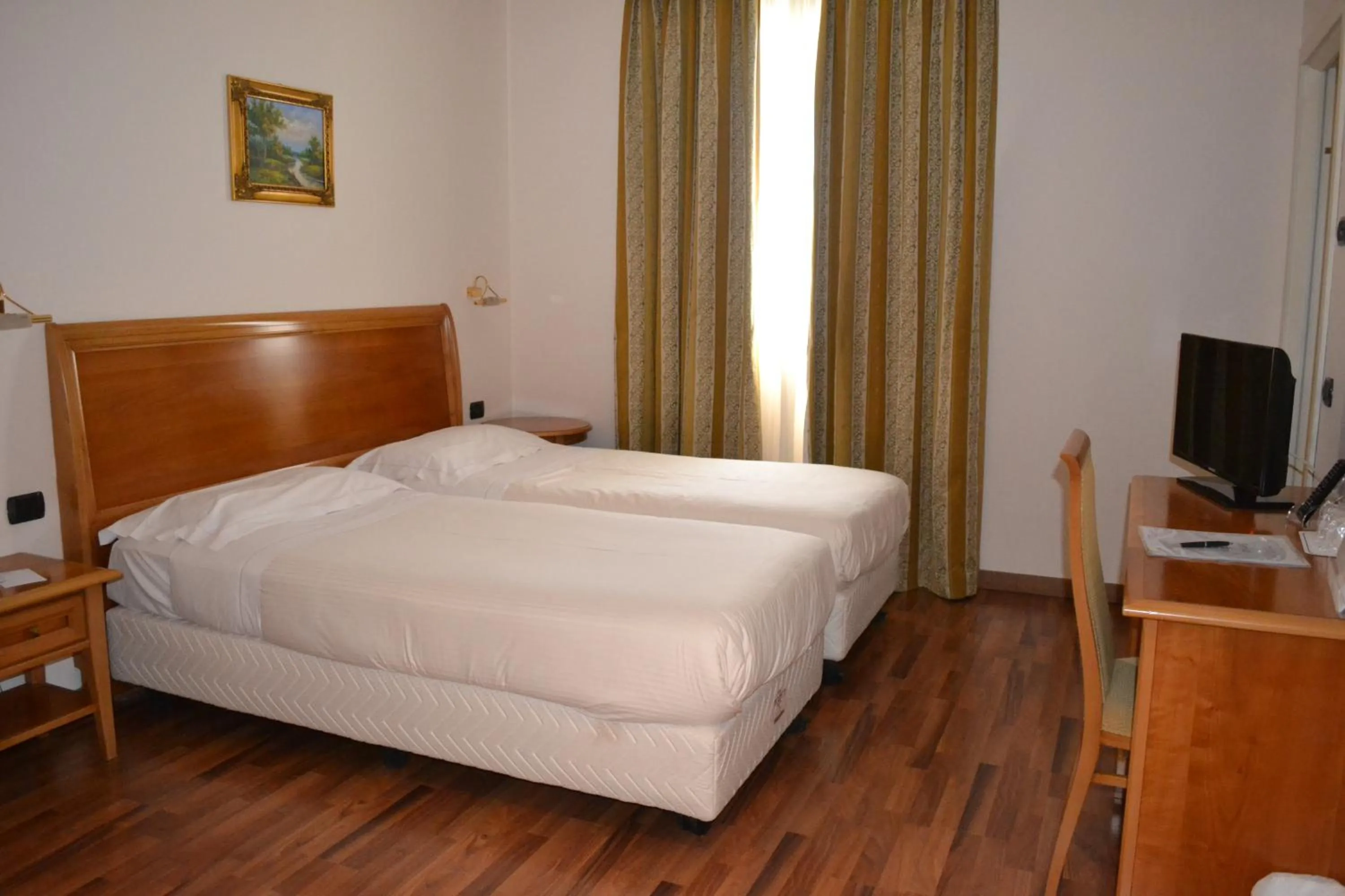 Bed in Tricolore Hotel