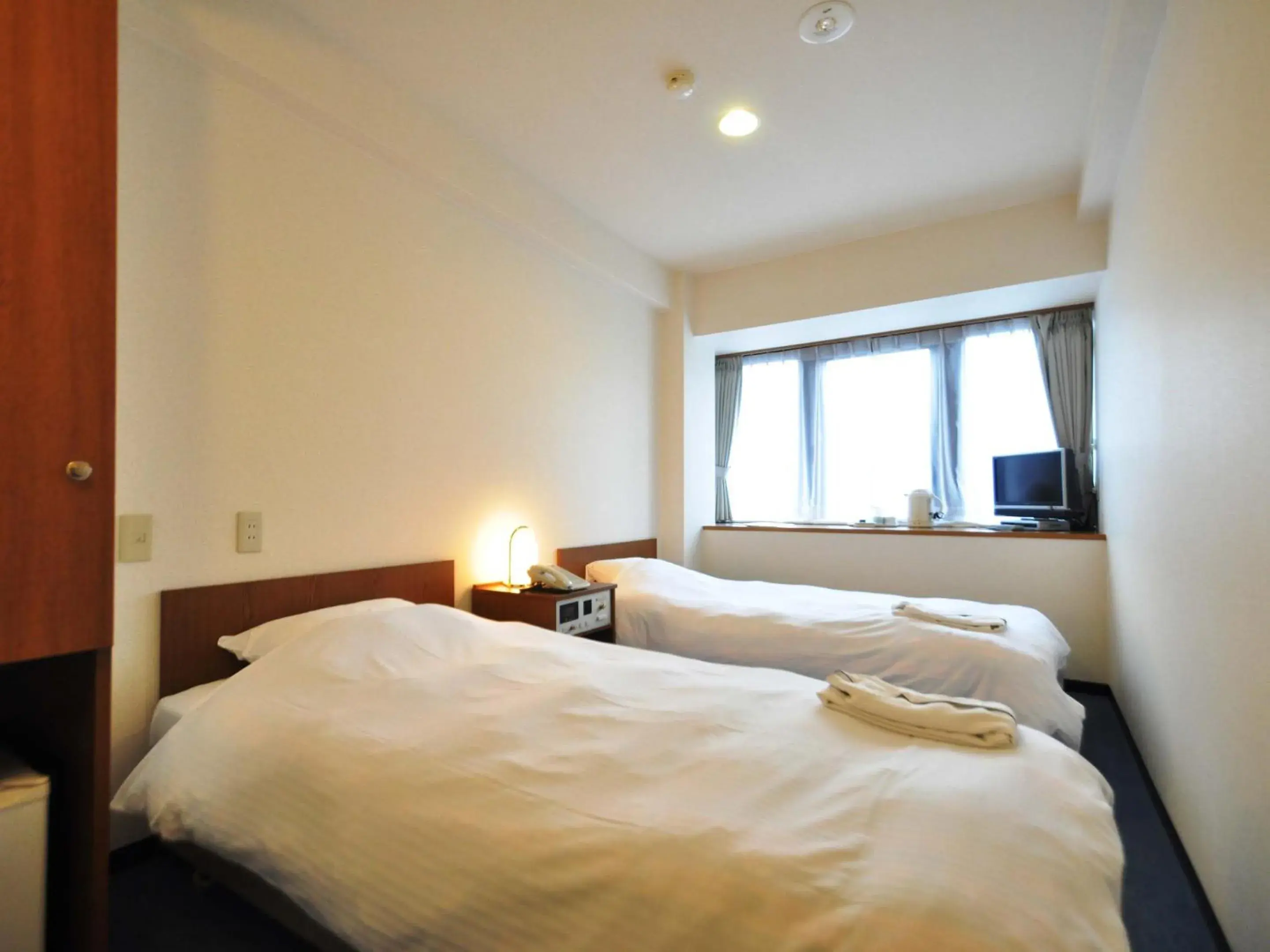 Bed in Hotel Koshien