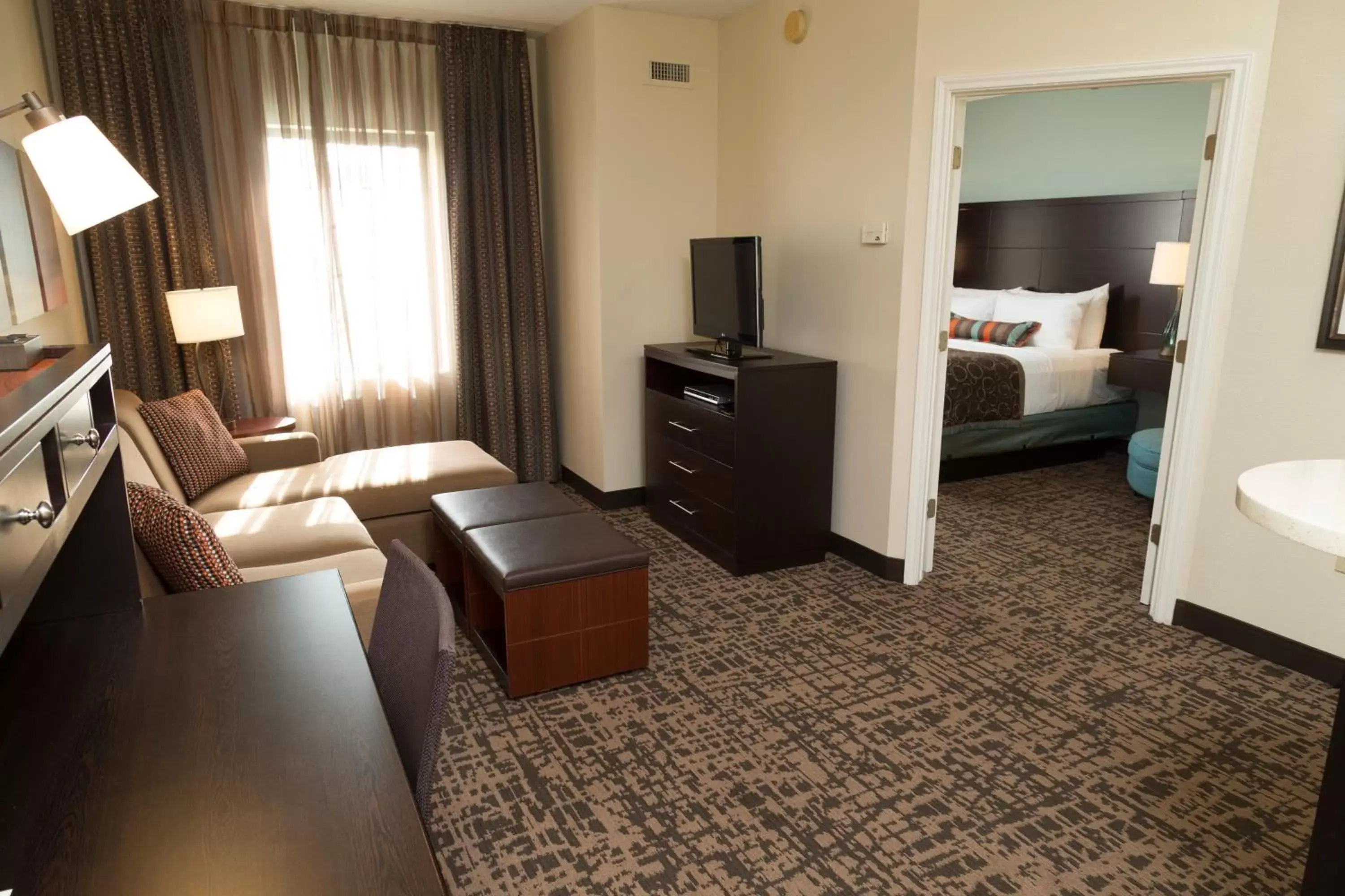 Living room, Seating Area in Staybridge Suites Indianapolis-Fishers, an IHG Hotel