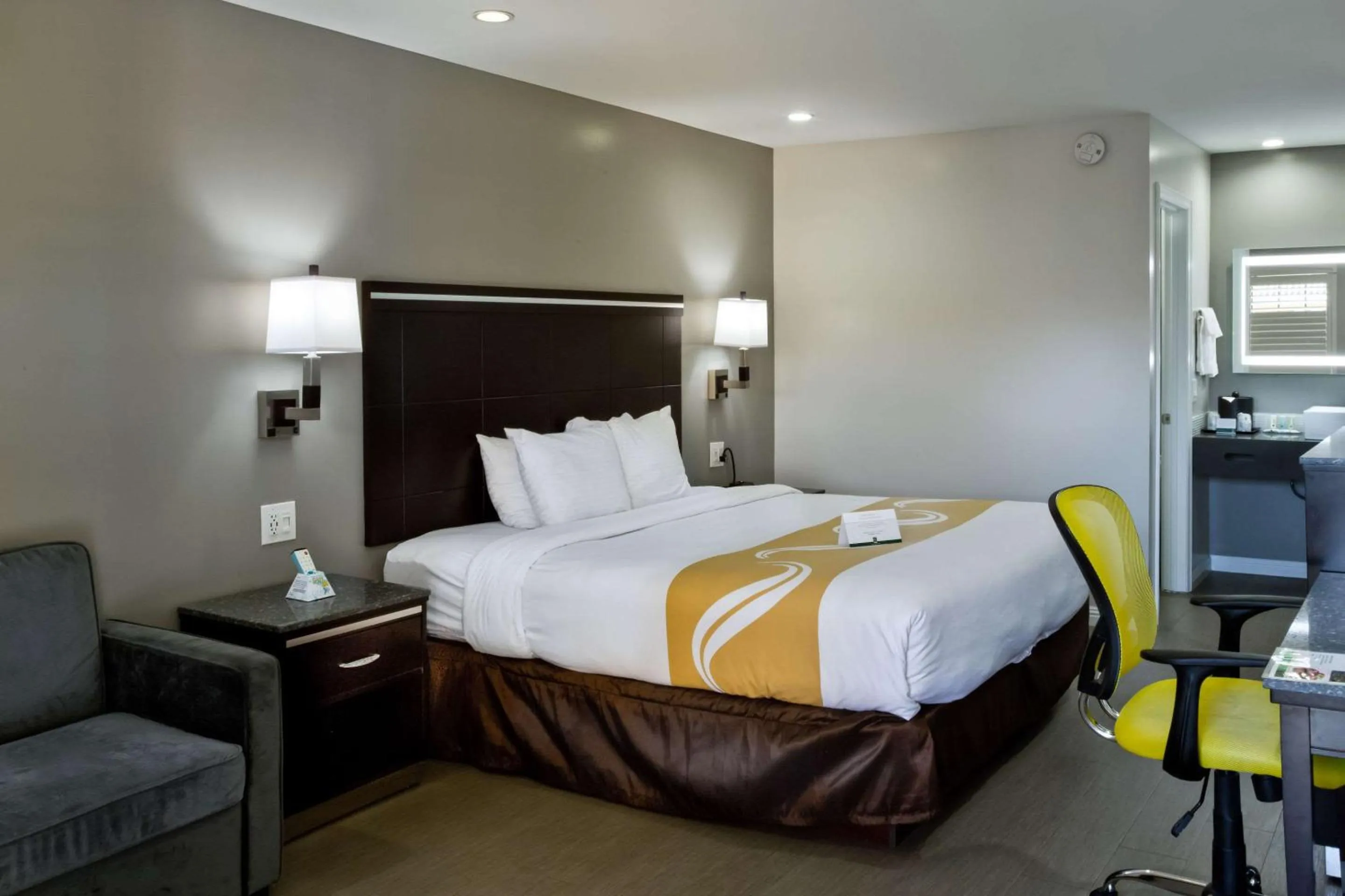 Photo of the whole room, Bed in Bay Area Inn & Suites