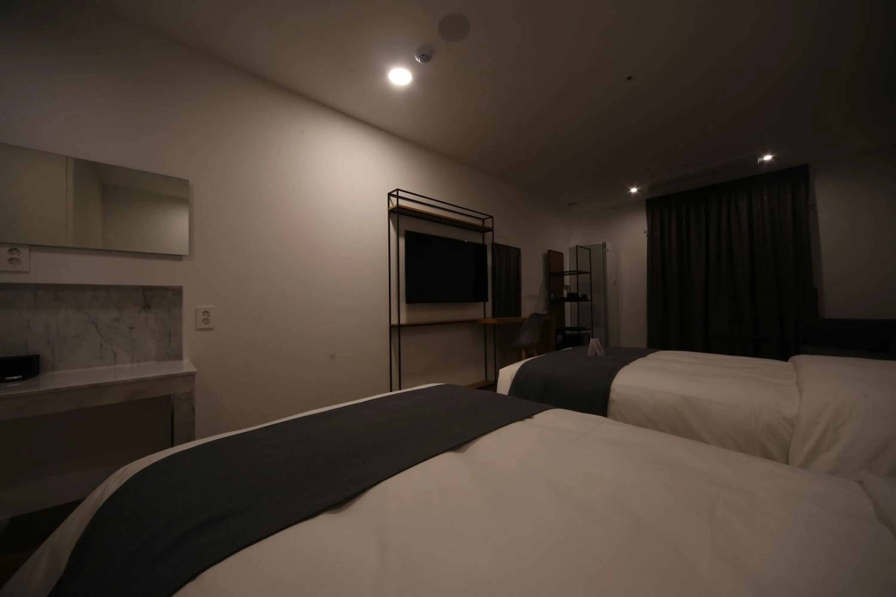 Bed in Hotel Noblestay