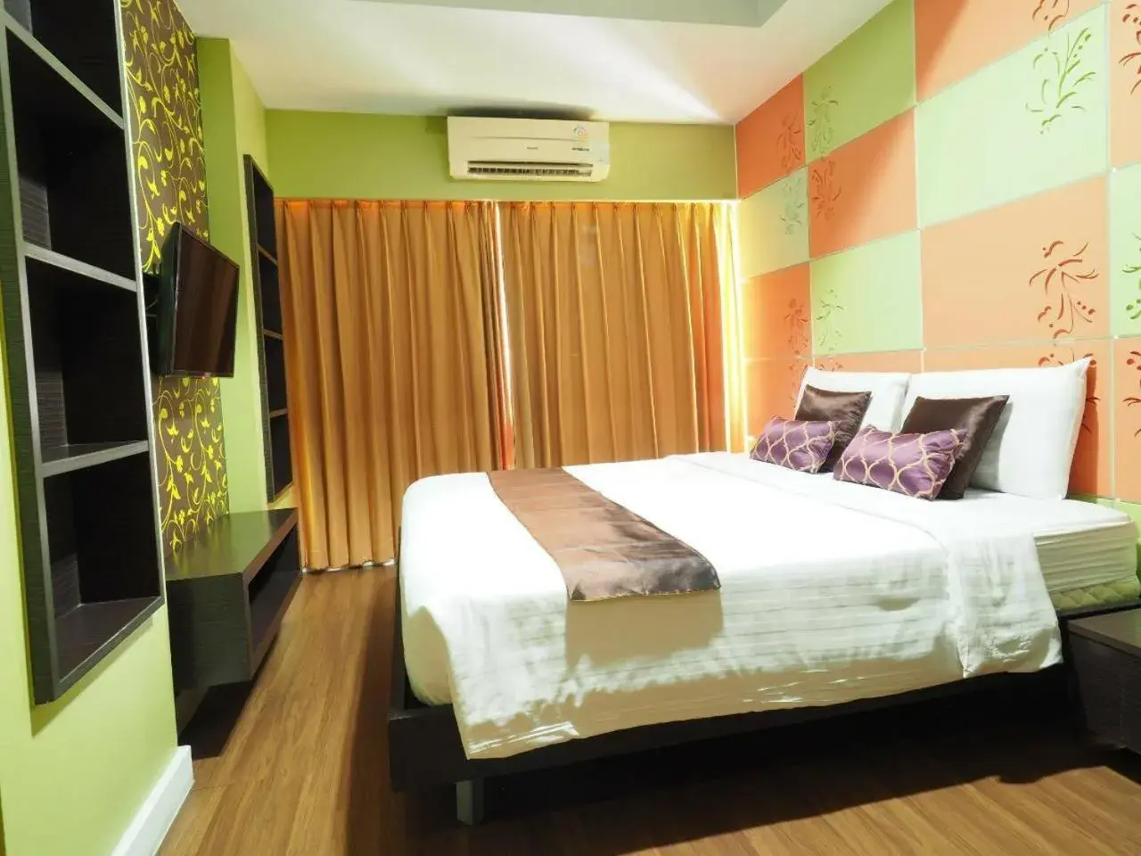 Bed in Bella B All Suite Bangkok