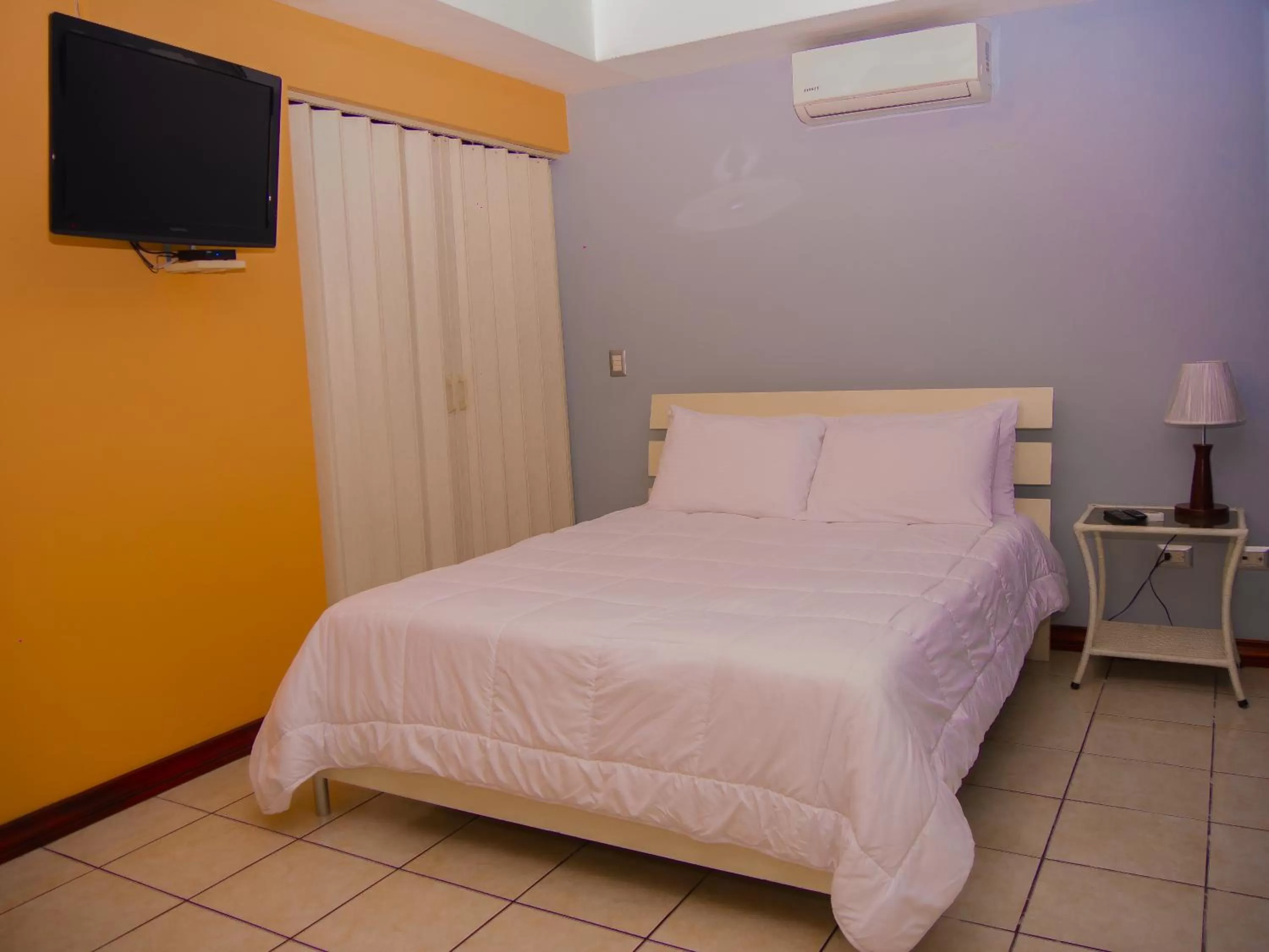 Bed in Hotel Bamboo Aeropuerto