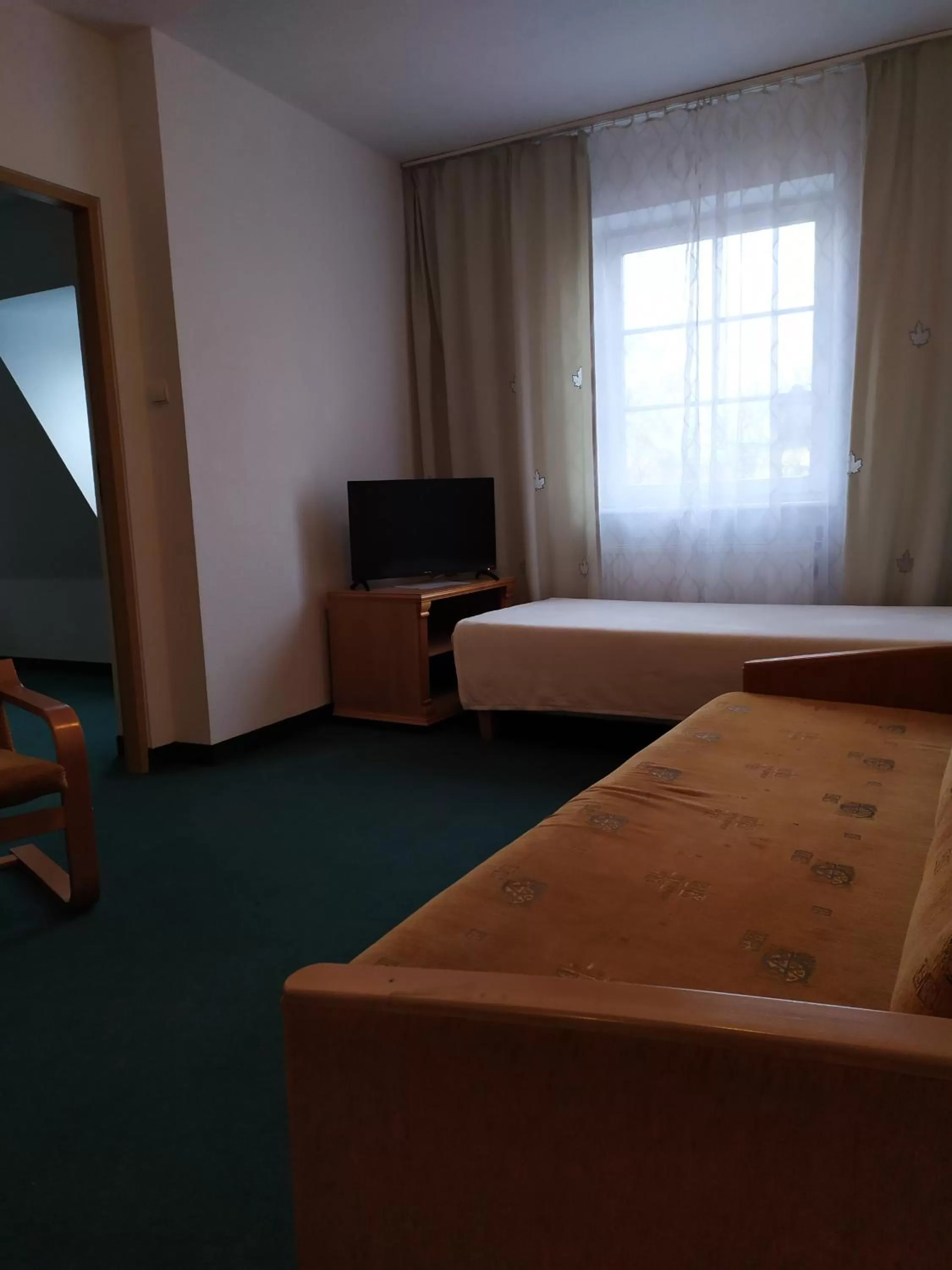 Communal lounge/ TV room in Dom Turysty