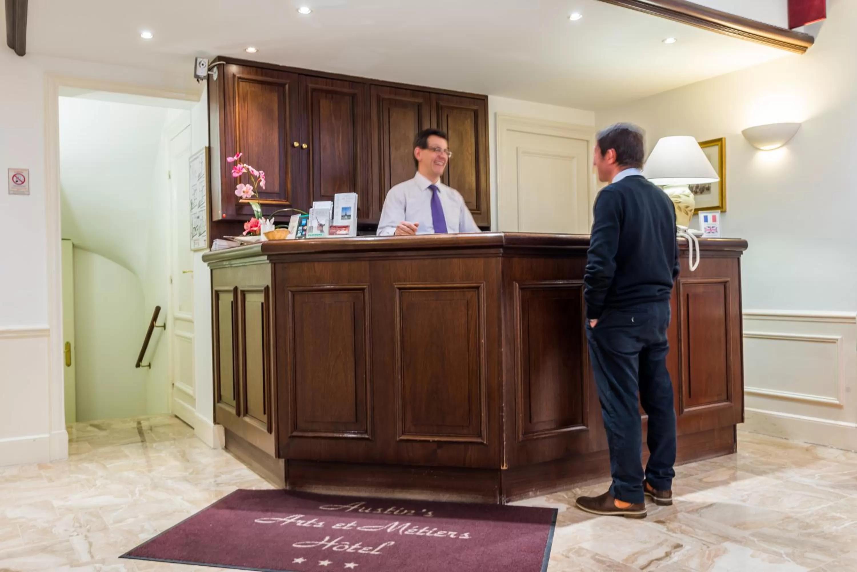 Lobby or reception in Austin's Arts Et Metiers Hotel